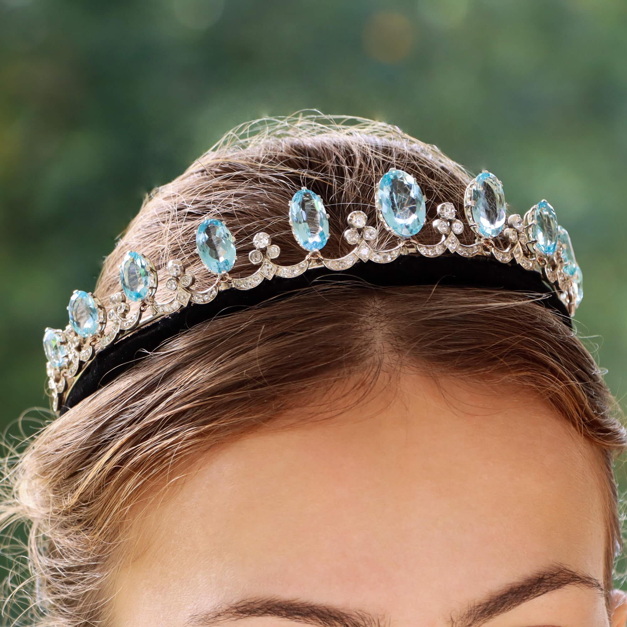 A truly phenomenal early Art Deco aquamarine and diamond convertible tiara set in silver and gold, circa 1920. 

This beautifully handcrafted tiara can be effortlessly transformed into a tiara and necklace proving to be an illustrative example of