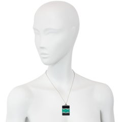 Early Art Deco enamel and diamond locket