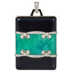 Early Art Deco enamel and diamond locket