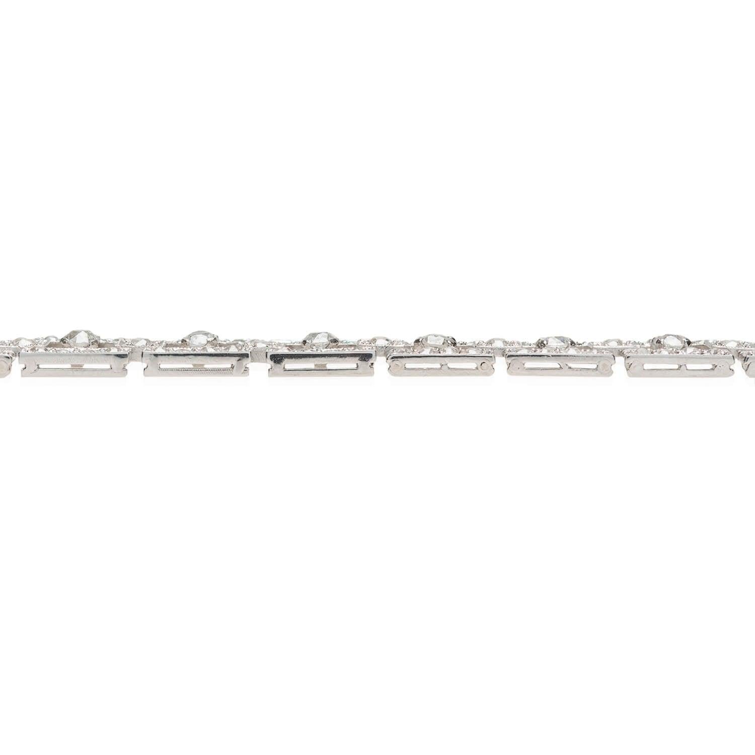 A stunning French diamond link bracelet from the early Art Deco (ca1910s) era! Crafted in platinum, this incredible bracelet glitters with approximately 3ctw of Old Mine Cut diamonds! The diamonds are all of wonderful H/I color and VS-SI clarity,