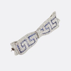 Early Art Deco Sapphire Diamond Greek Key Bow Brooch