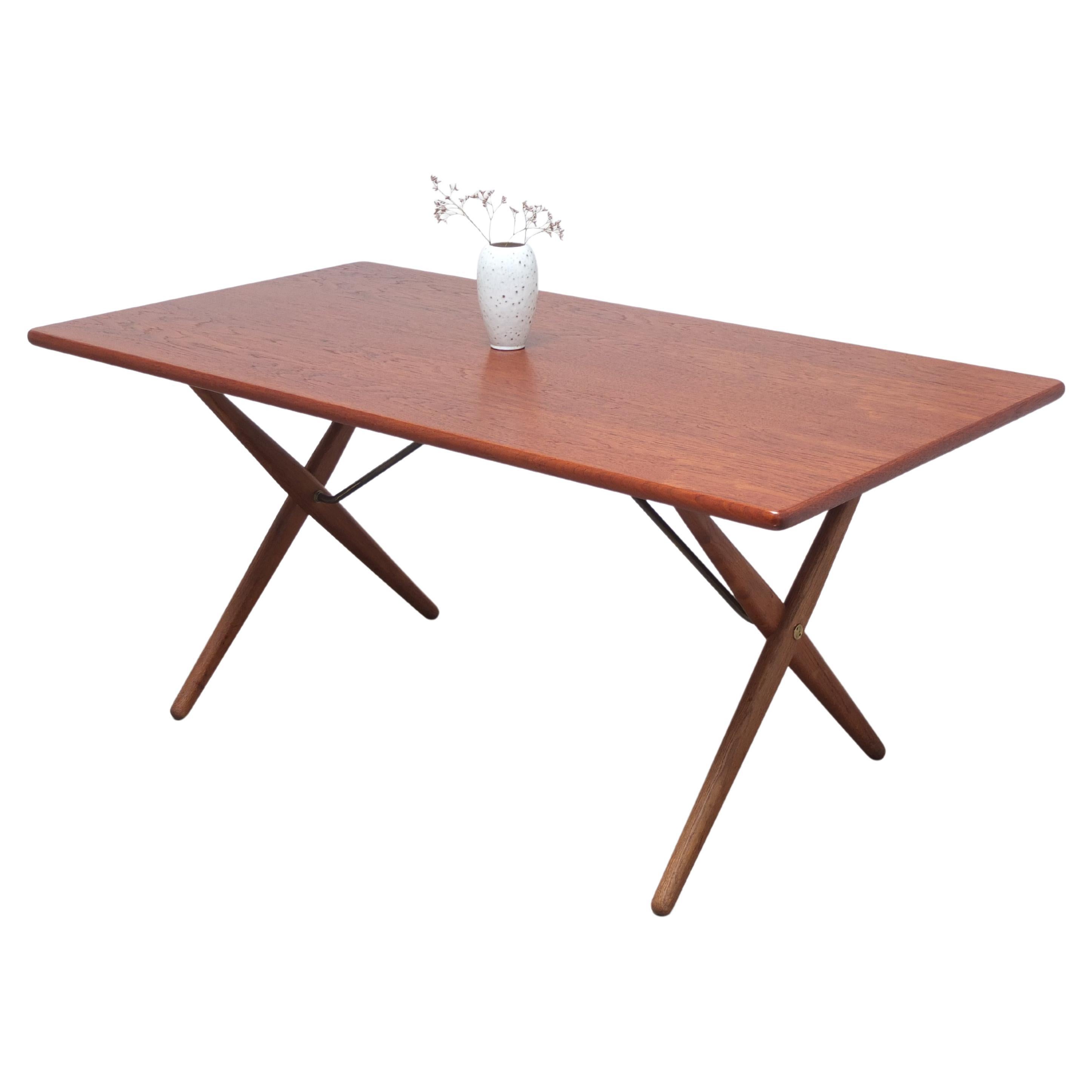 Early 'AT 303' Cross-Leg Table by Hans J. Wegner for Andreas Tuck, 1955 For Sale