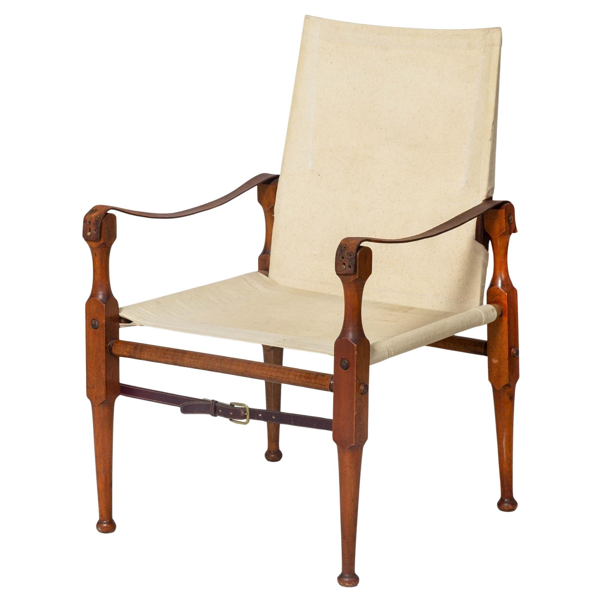 What is the difference between an armchair and an easy chair?