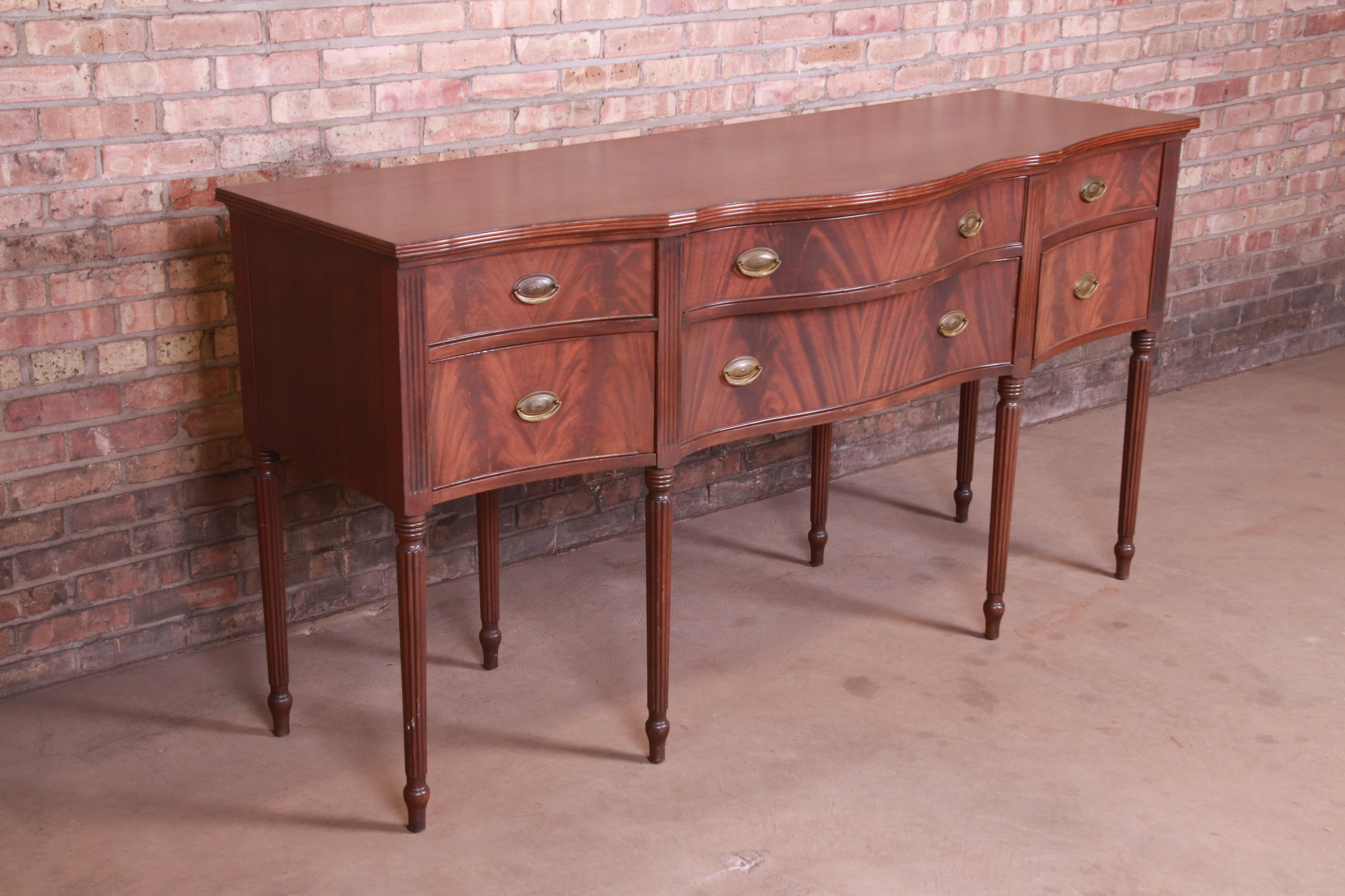 Early 20th Century Early Baker Furniture Flame Mahogany Hepplewhite Sideboard Credenza, circa 1920s