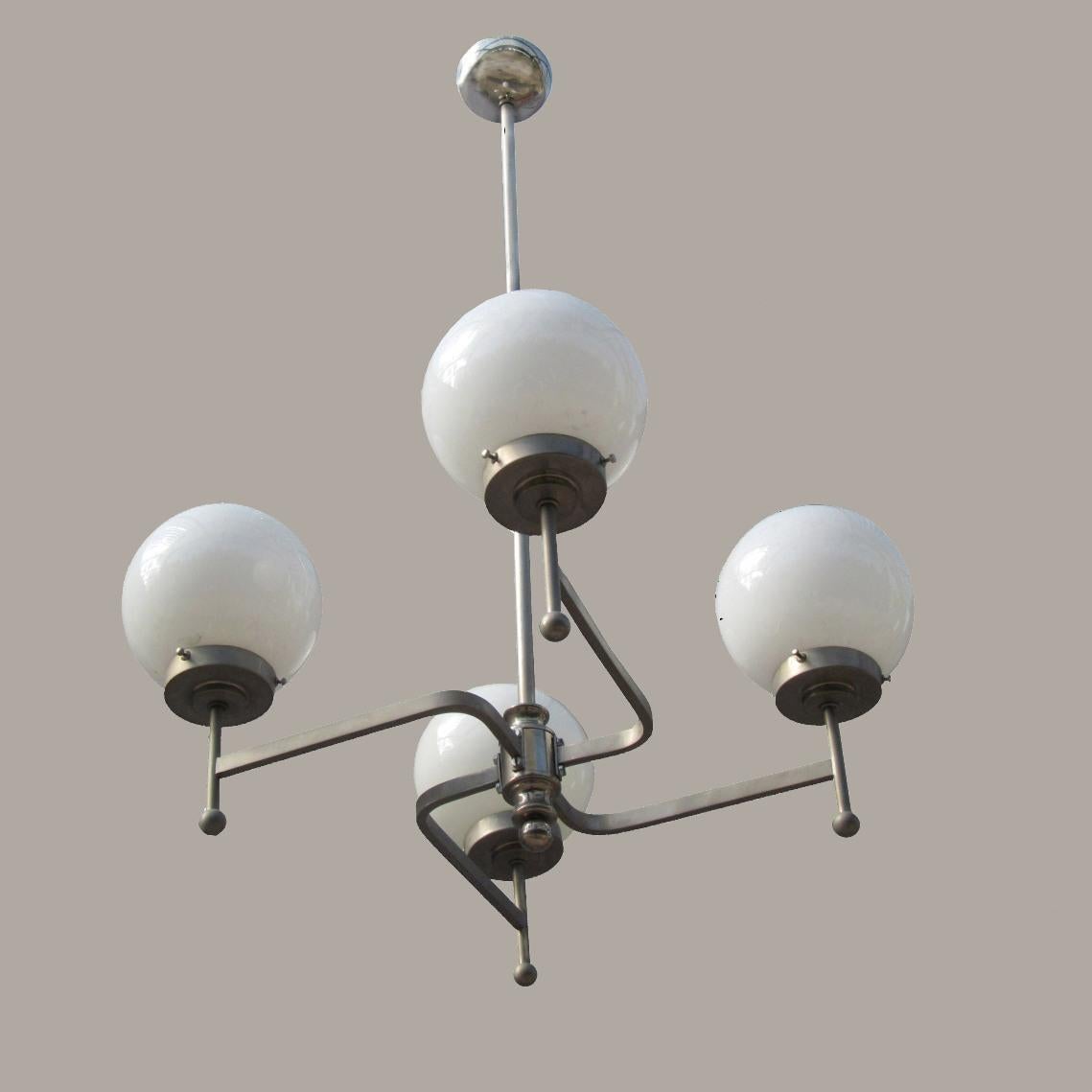 Plated Early Bauhaus Four Opaline Sphere Lights Manji Shaped Chandelier, Germany, 1920s For Sale