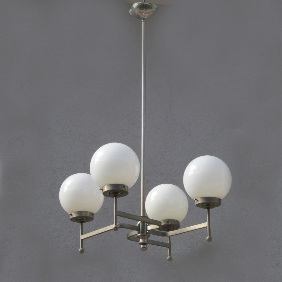 Early 20th Century Early Bauhaus Four Opaline Sphere Lights Manji Shaped Chandelier, Germany, 1920s For Sale