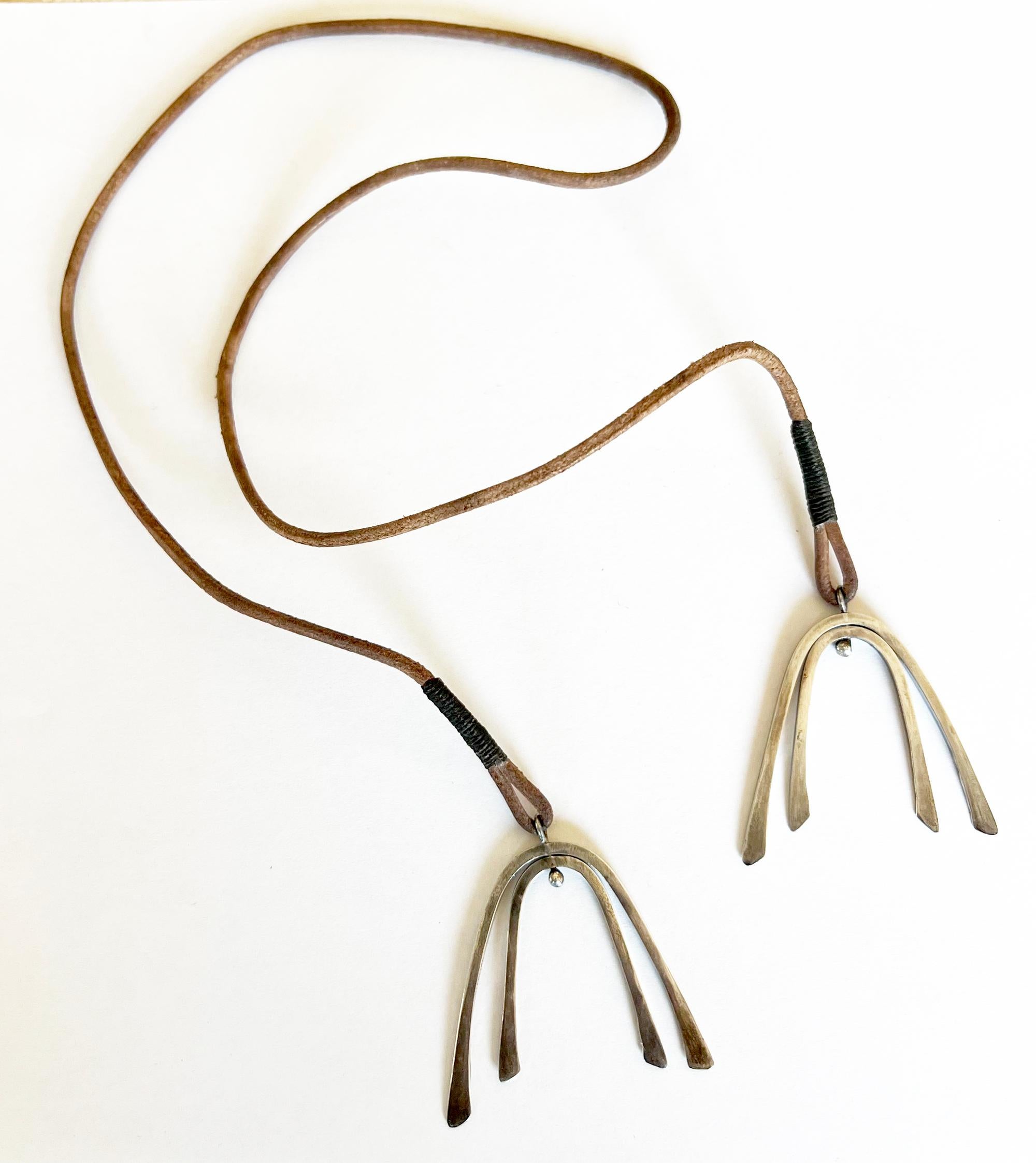 Early Betty Cooke Kinetic Sterling Wishbone Pendants Lariat on Leather Cord In Good Condition For Sale In Palm Springs, CA