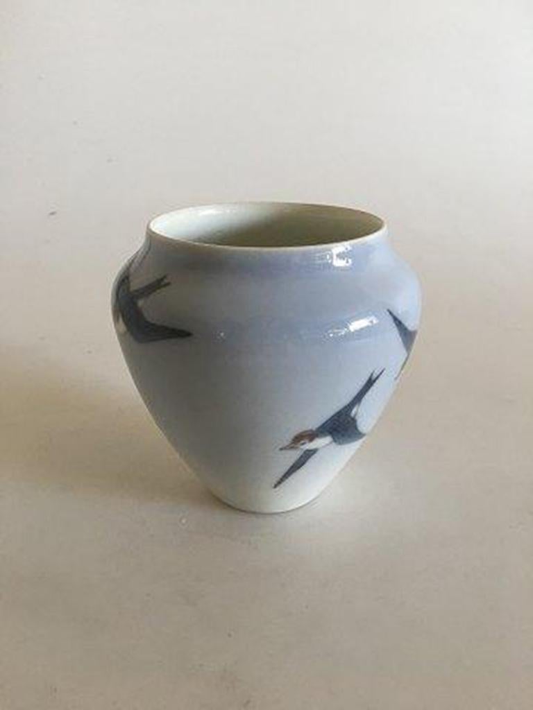 Early Bing & Grondahl Unique vase with bird by Effie Hegermann-Lindencrone. 

Measures 10cm and is in perfect condition.
 