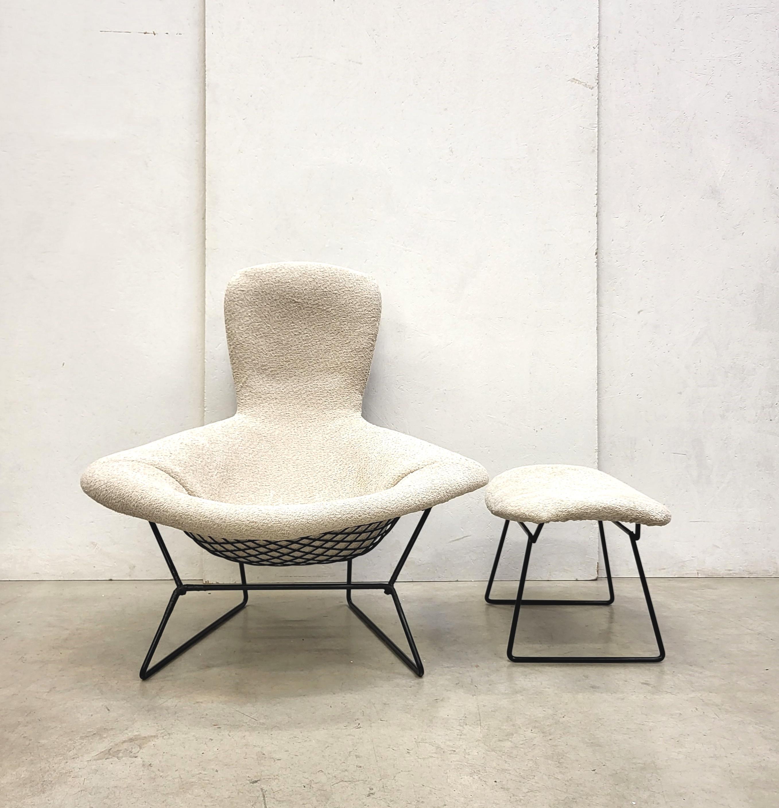 Early Bouclé wool edition Bird chair & ottoman by Harry Bertoia for Knoll. 

The groundbreaking Bird chair was designed in the 50s by Harry Bertoia and made by Knoll.
This mid-century classic supports countless positions and offers a comforting