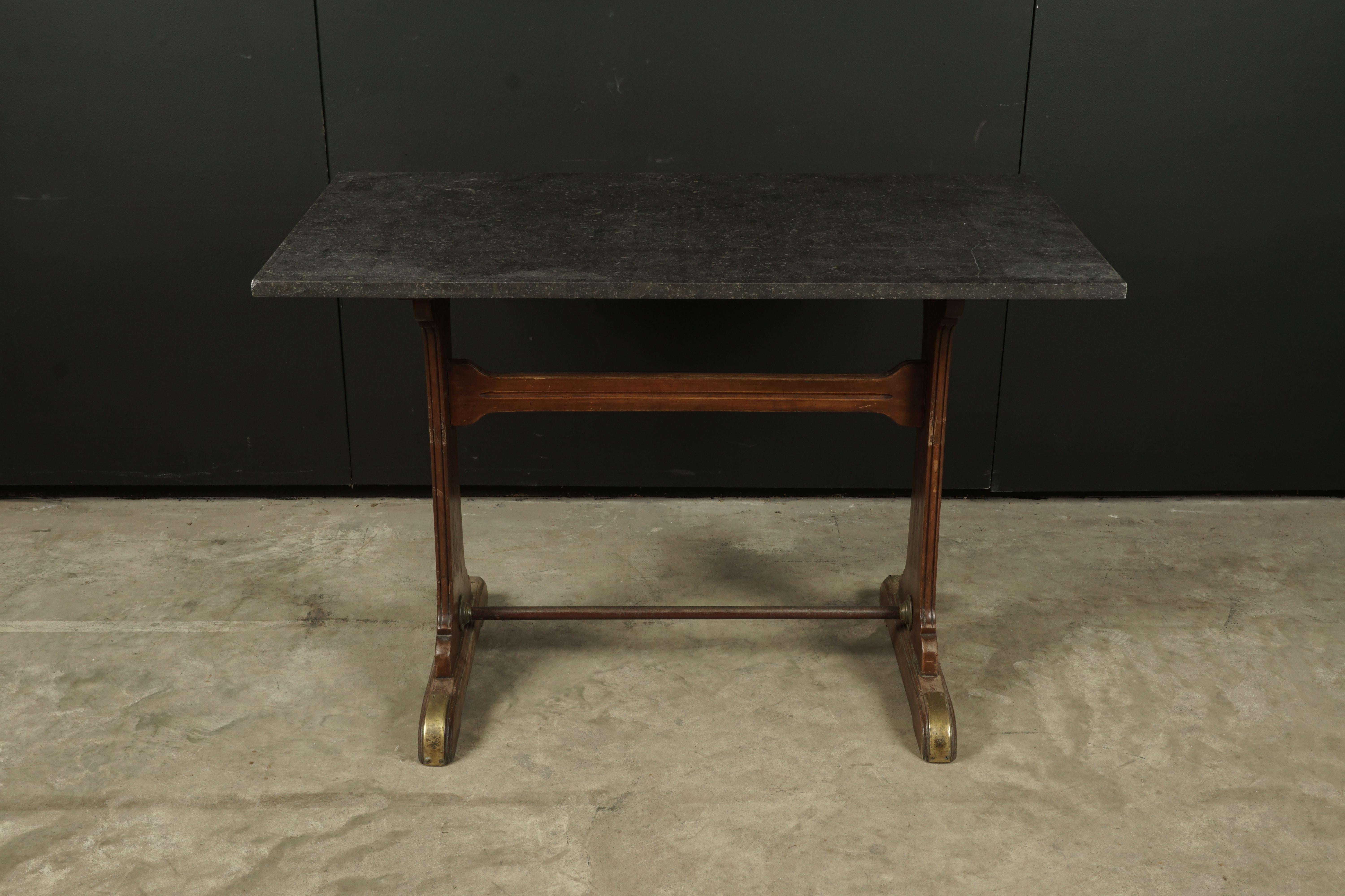Vintage bistro table from France, 1950s. Original base with later top of Belgian blue stone.