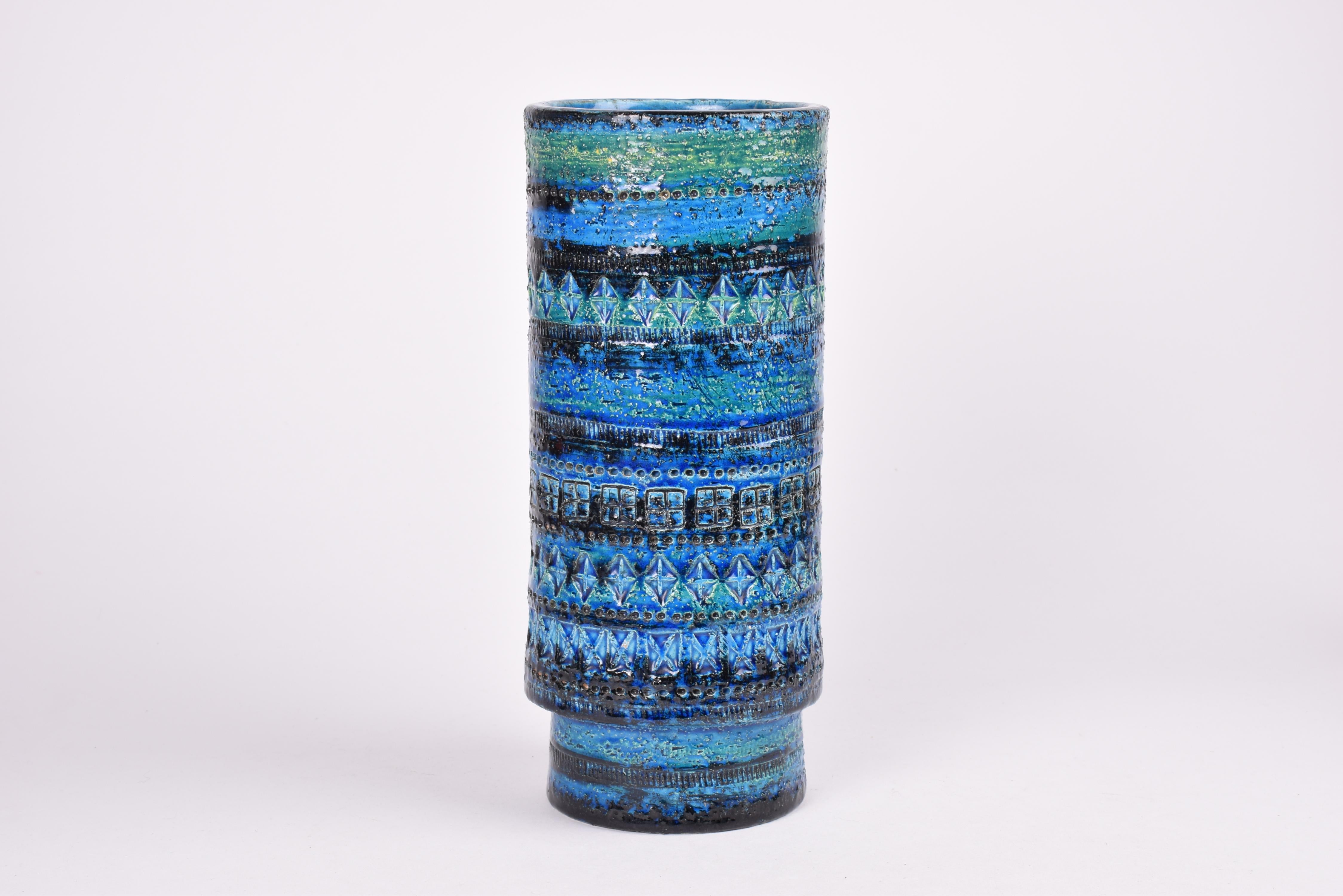 Very tall cylindrical vase from the Rimini Blu series by Aldo Londi for Bitossi, Italy.
We suppose it´s from the early production as it is handthrown which you can see when looking inside the vase and it´s handsigned on bottom. 
Made ca 1950s or