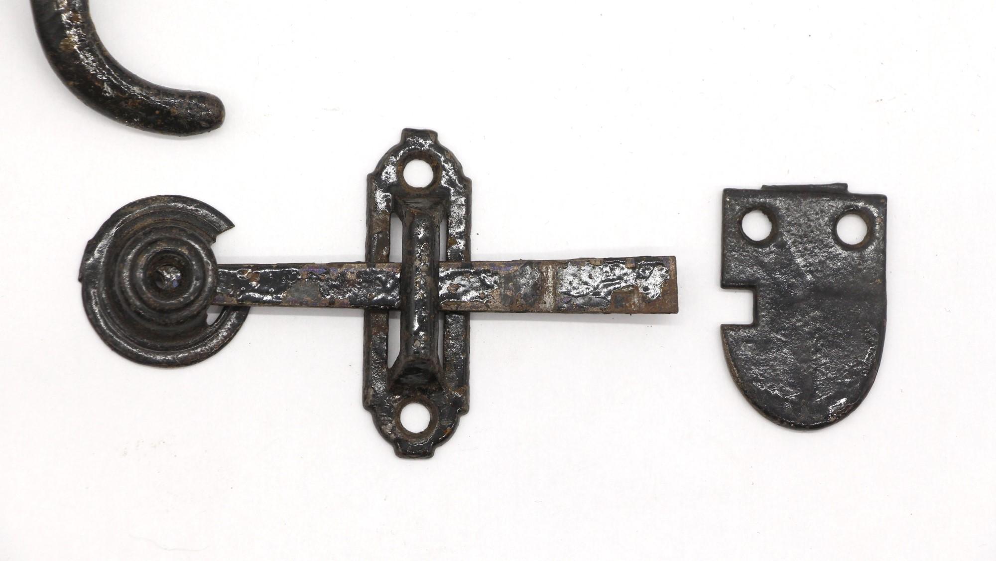 Early 20th century set black cast iron door handle with latch. Complete with all the parts. Light wear. Priced per set. Small quantity available at time of posting. Priced each. Please inquire. Please note, this item is located in our Scranton, PA
