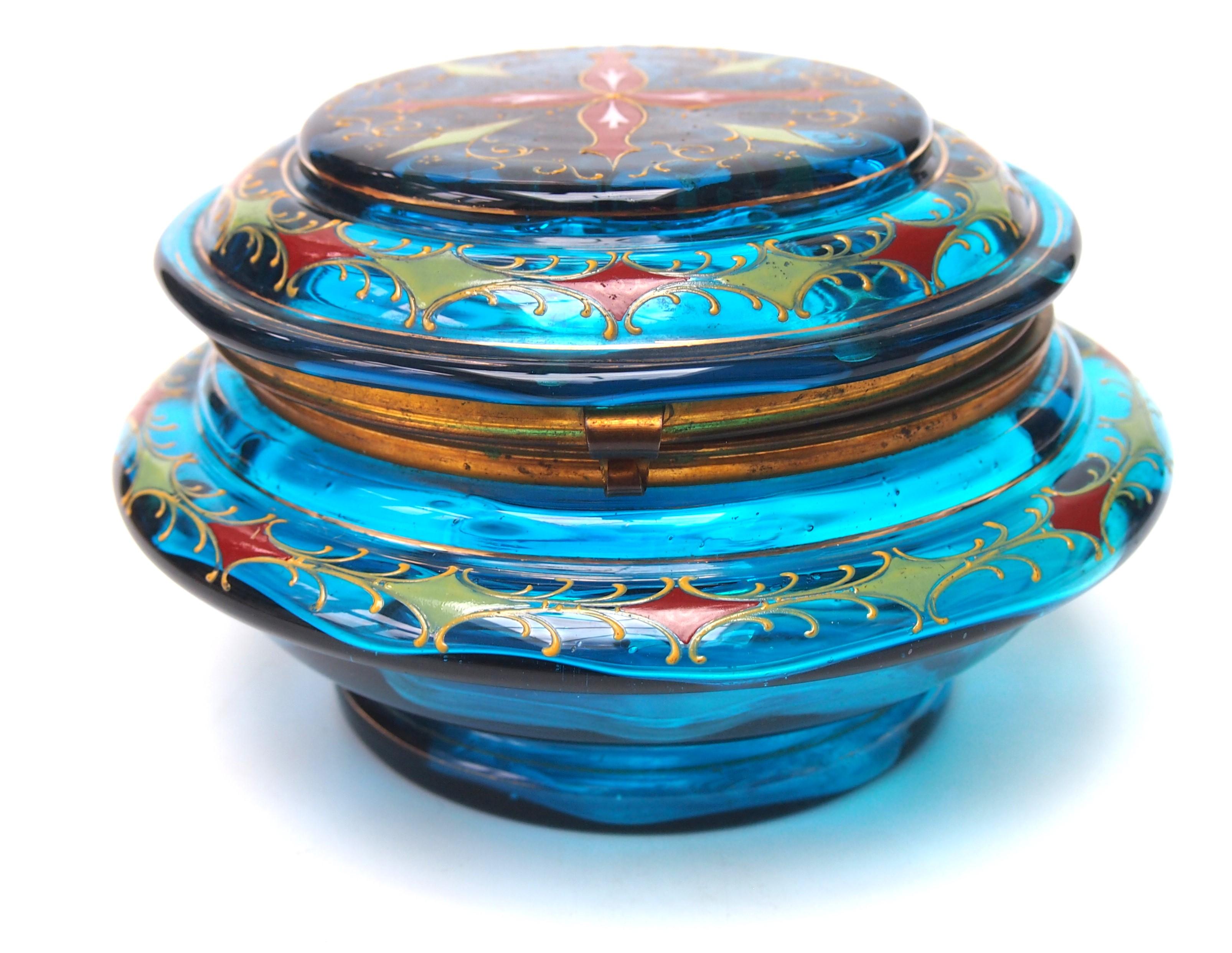 Fabulous good sized early metal clad box attributed to Moser c 1895 in bright blue coloured glass heavily enamelled  with a stylised kite-block pattern in pale greens and orange red and yellow curls -the decoration is on the top of the box and on