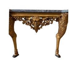 Early C19th century gilt console with Bacchus head detail and marble top