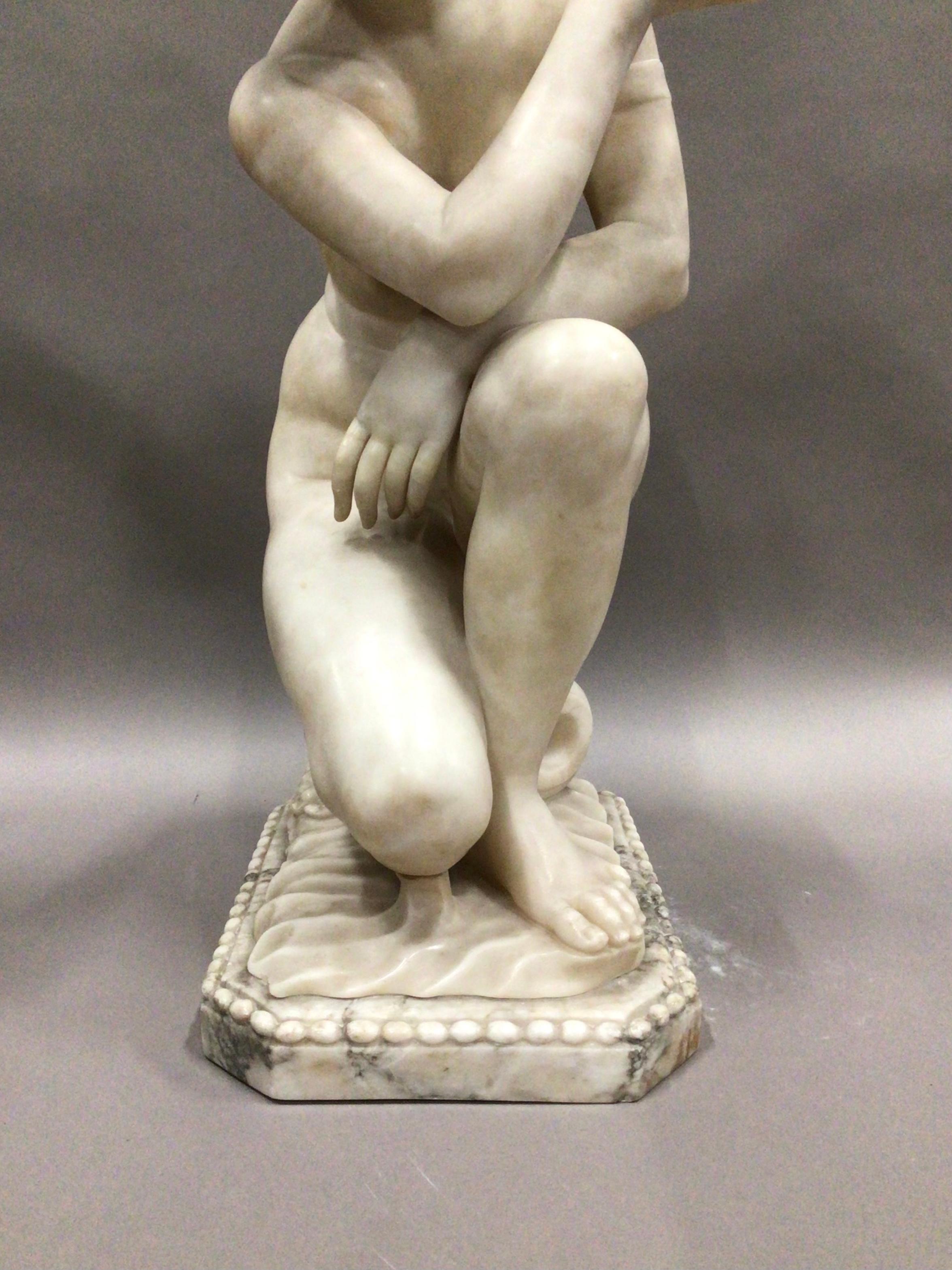 Carved Early C19th Large marble figure of Crouching Venus For Sale