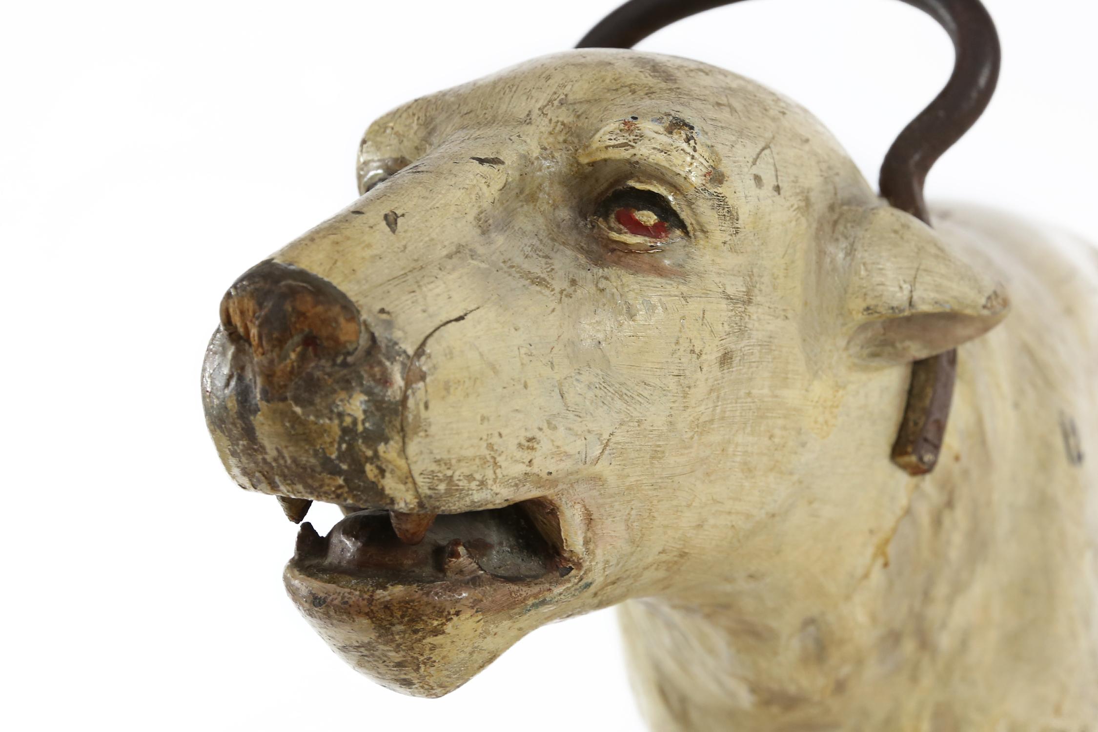 An early 20th century carousel polar bear in carved and painted wood by Bernard van Guyse, Belgium, from the famous Noah's ark carousel. This polar bear is a remarkable example of Bernard van Guyse's wood-carving talents. A trained sculptor, van