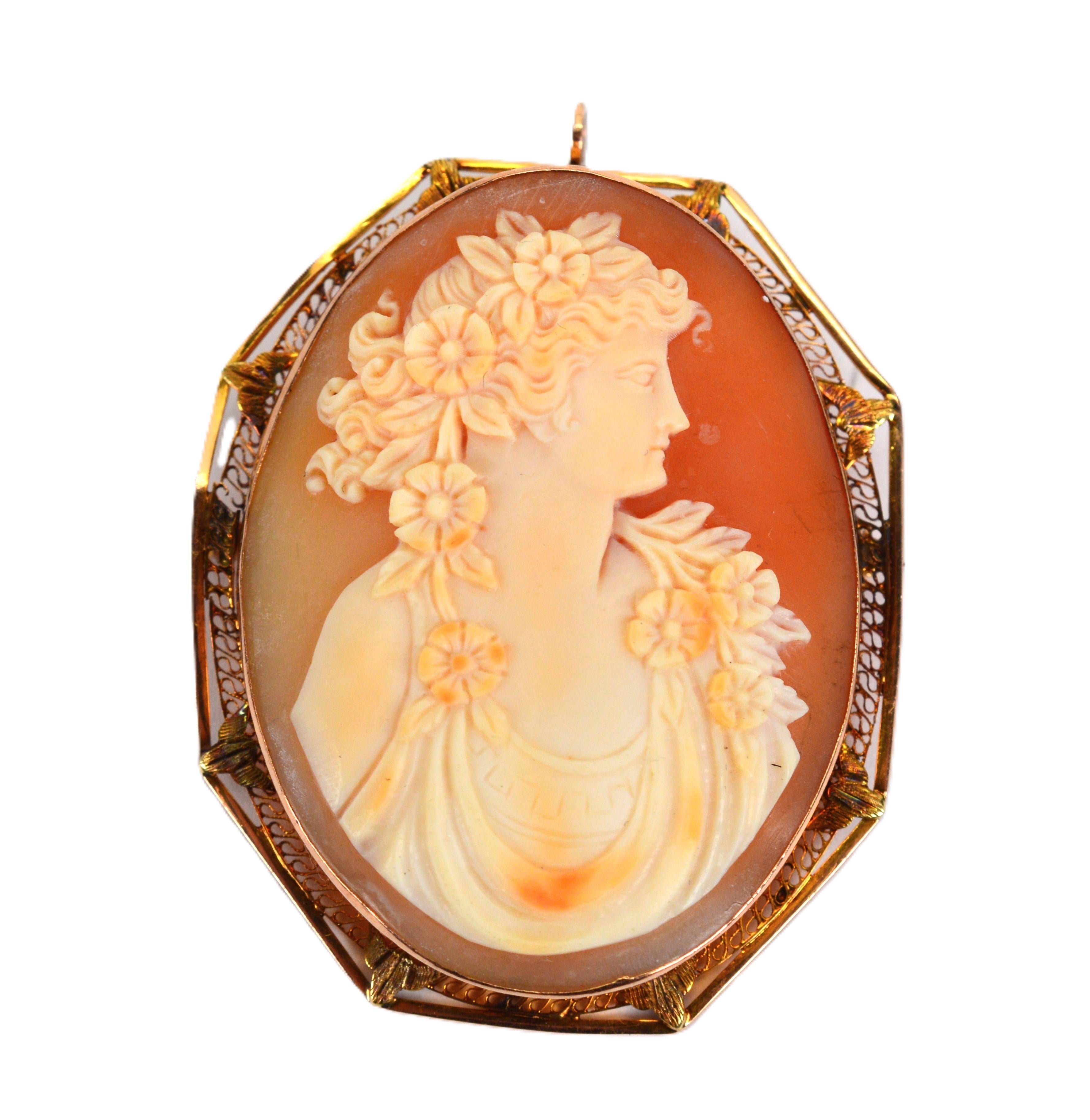 It's hard to resist the eternal beauty of these stunning hand carved period pieces. With fine detail, the floral head dress and a draping bodice lend to the romance of this heirloom cameo hand carved by a master craftsman a century ago. Framed with
