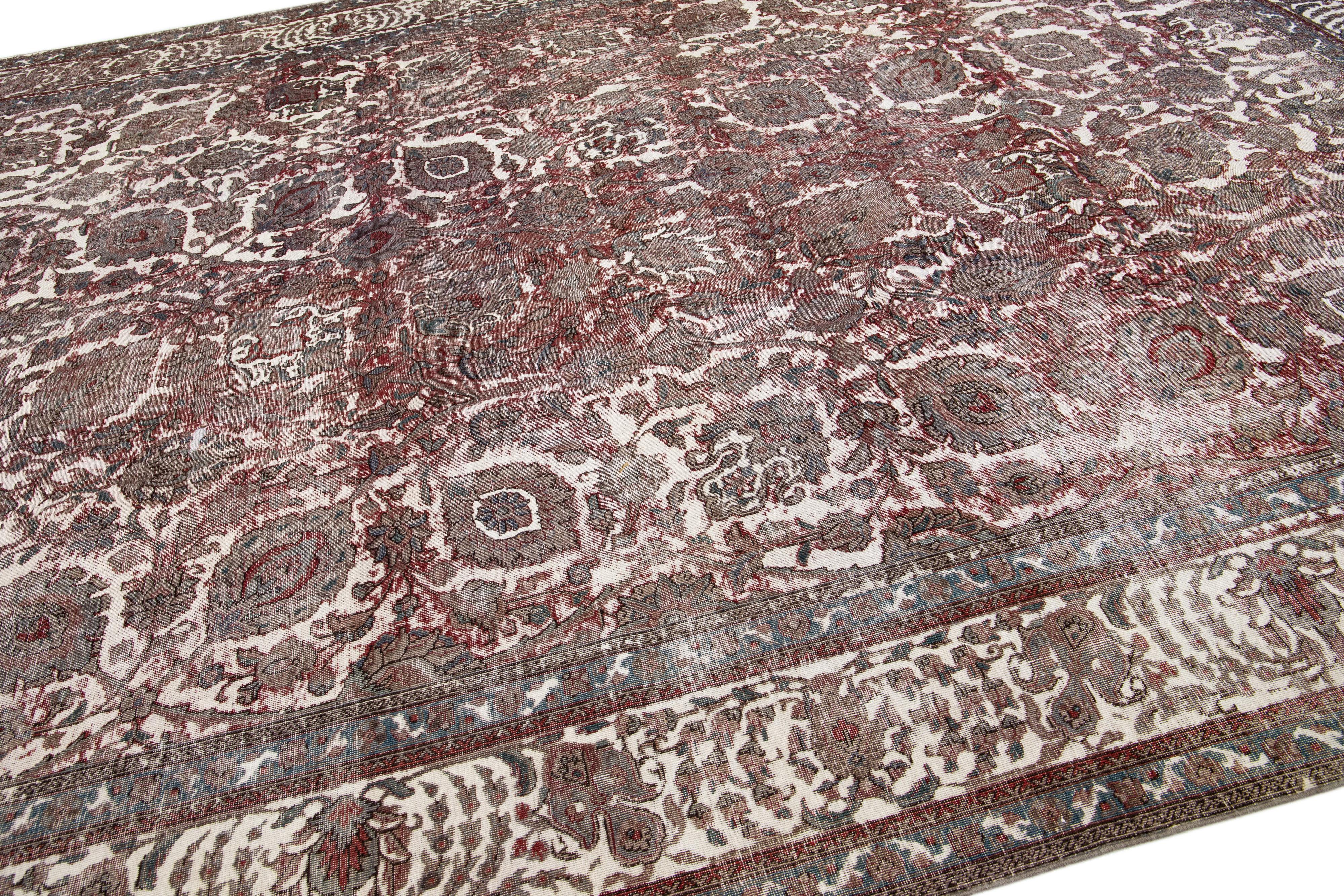 Hand-Knotted Vintage Handmade Distressed Persian Wool Rug In Red For Sale