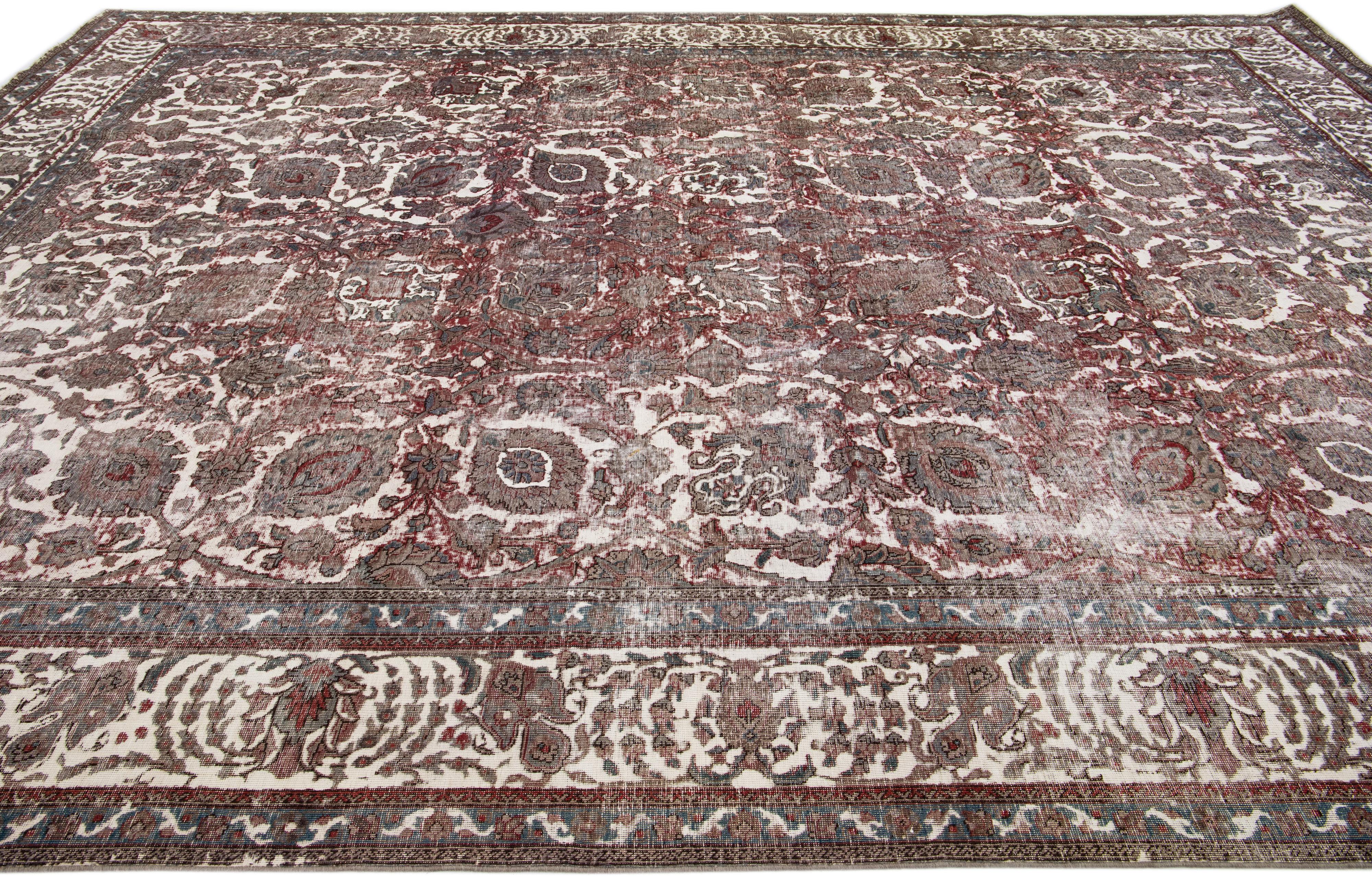 Vintage Handmade Distressed Persian Wool Rug In Red In Distressed Condition For Sale In Norwalk, CT