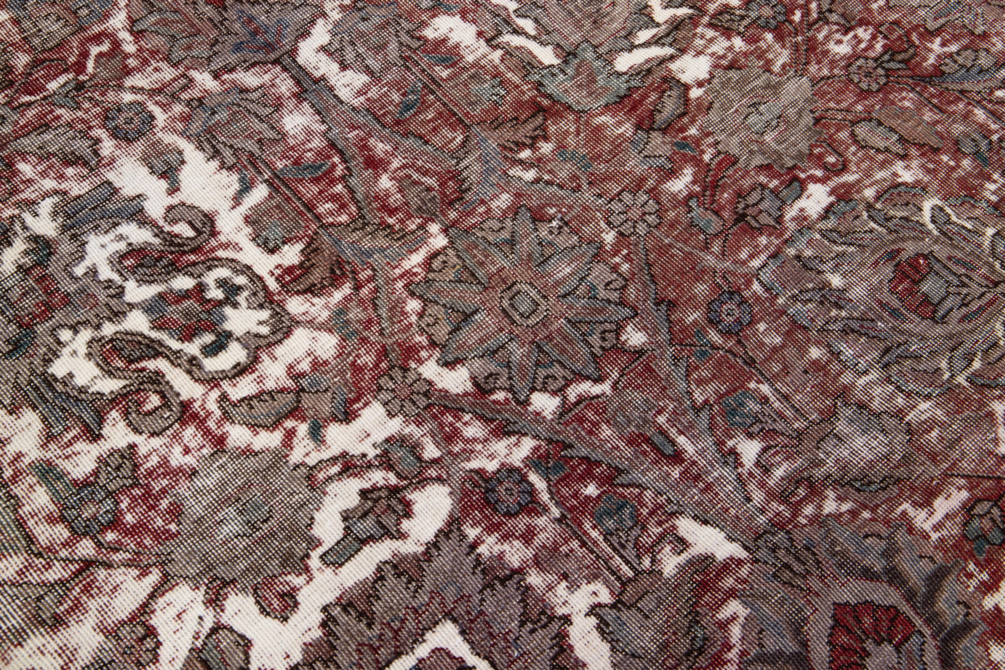 Vintage Handmade Distressed Persian Wool Rug In Red For Sale 1