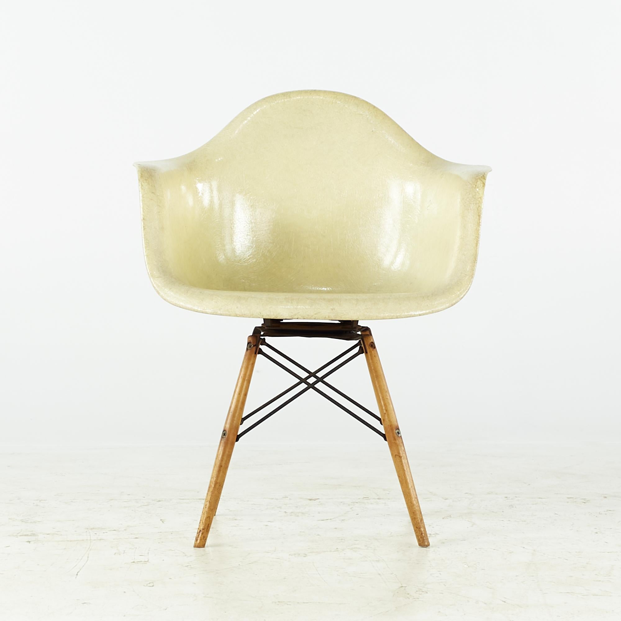 Early Charles and Ray Eames for Herman Miller midcentury rope edge armchair

This chair measures: 24.5 wide x 22 deep x 31 inches high, with a seat height of 16 and arm height/chair clearance of 25 inches

All pieces of furniture can be had in