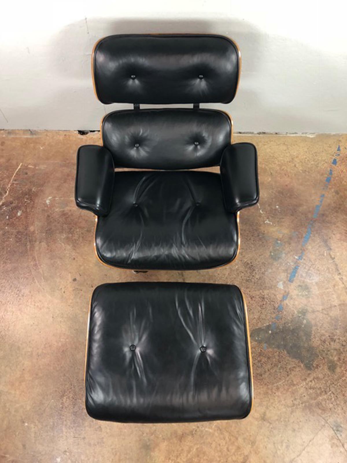 Early Herman Miller Eames 670/671 lounge and ottoman in walnut, 1958.  Very good condition. This piece was refinished and crafted with new leather by an entity in Los Angeles that specializes in Eames restoration and was lightly used since that