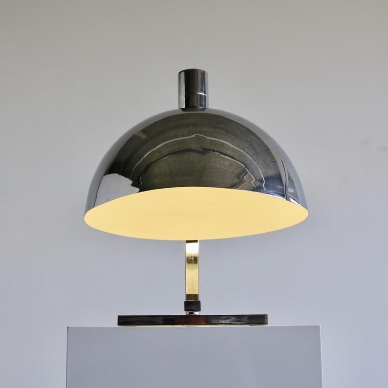 An early model table lamp, designed by Franco Albini, Antonio Piva and Franca Helg. Italy, Sirrah, 1969.

Large table lamp with chrome-plated stem and lamp shade. Rare in this shape with chromed shade.

Reference: Krzentowski, C. & D. The