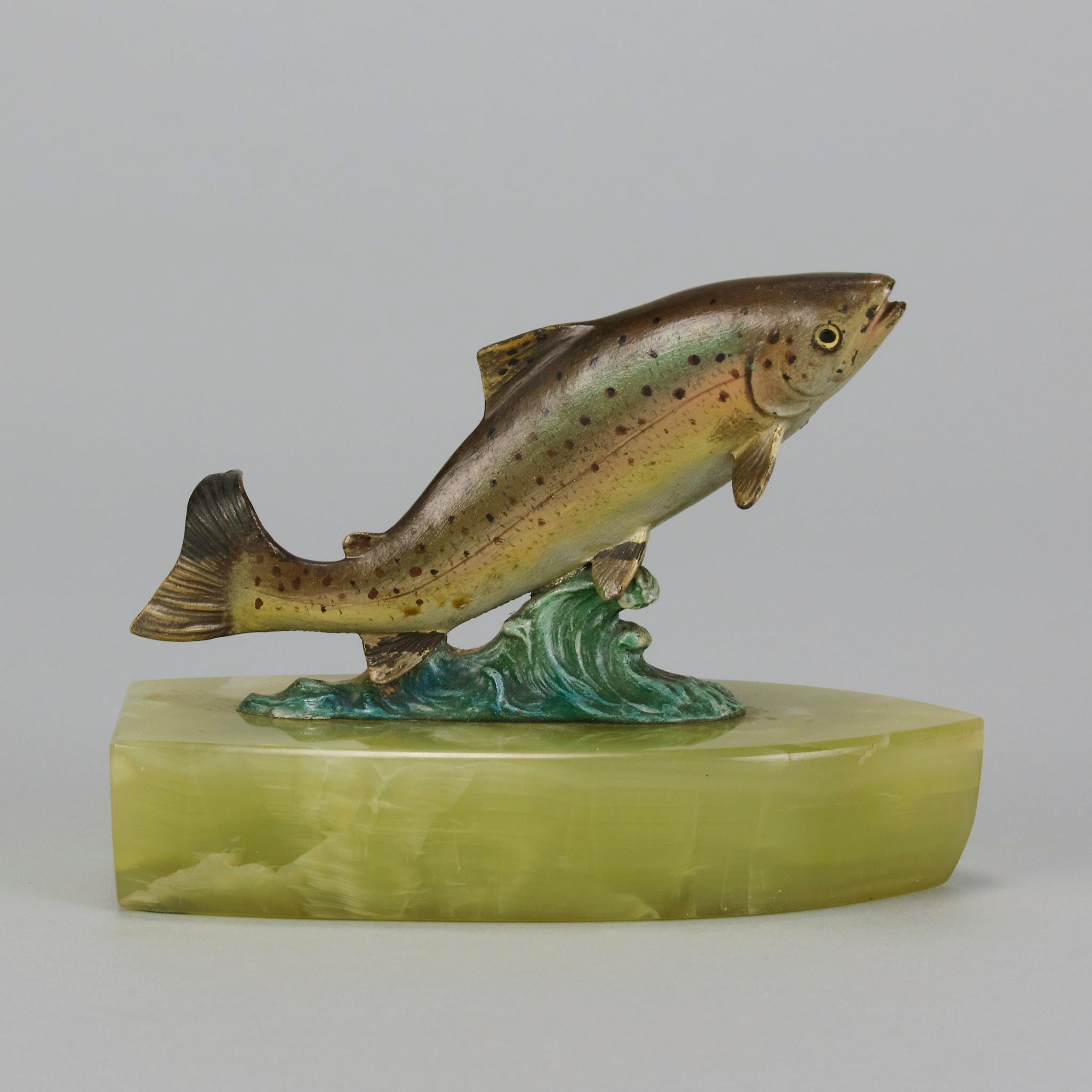 Very fine cold painted Austrian Bronze study of a salmon leaping from the water. The bronze with excellent cold painted colours and very fine hand chased surface detail, raised on a shaped onyx plinth

ADDITIONAL INFORMATION
Height: 10 cm