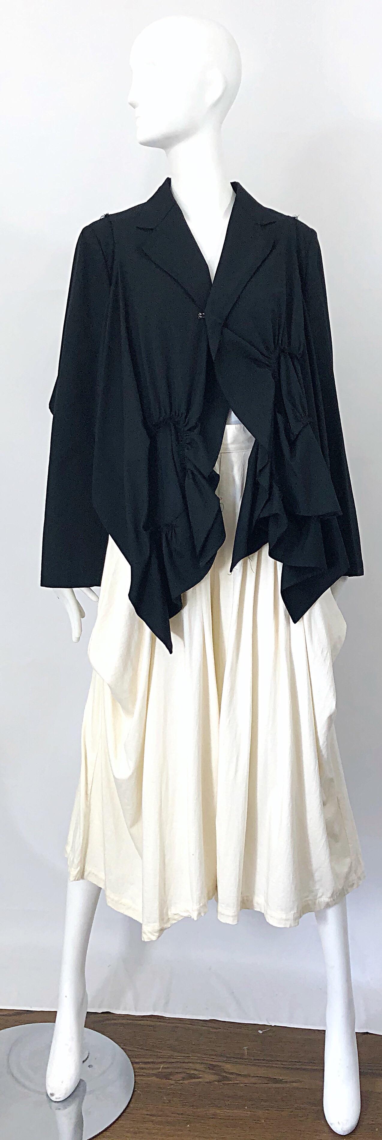 Insane early vintage COMMES DES GARCONS 1980s ivory wide leg culottes! Avant Garde style with so much detail. Hidden zipper up th eback with two buttons at back waistband. Super soft and flattering cotton offers some stretch. The pictured 90s CDG
