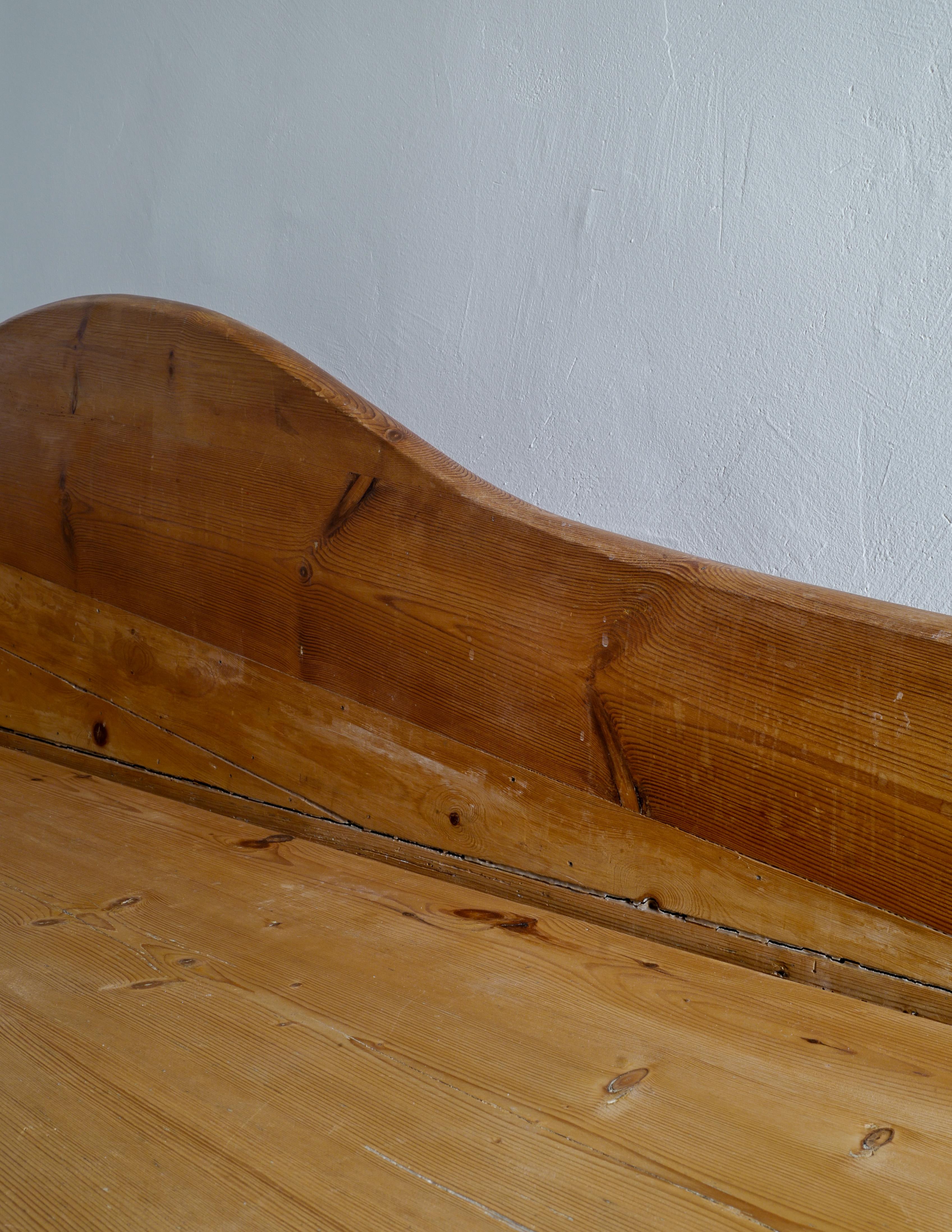 Early 20th Century Early Curved Sofa / Canapé in Solid Stained Pine Produced in Sweden, 1920s 