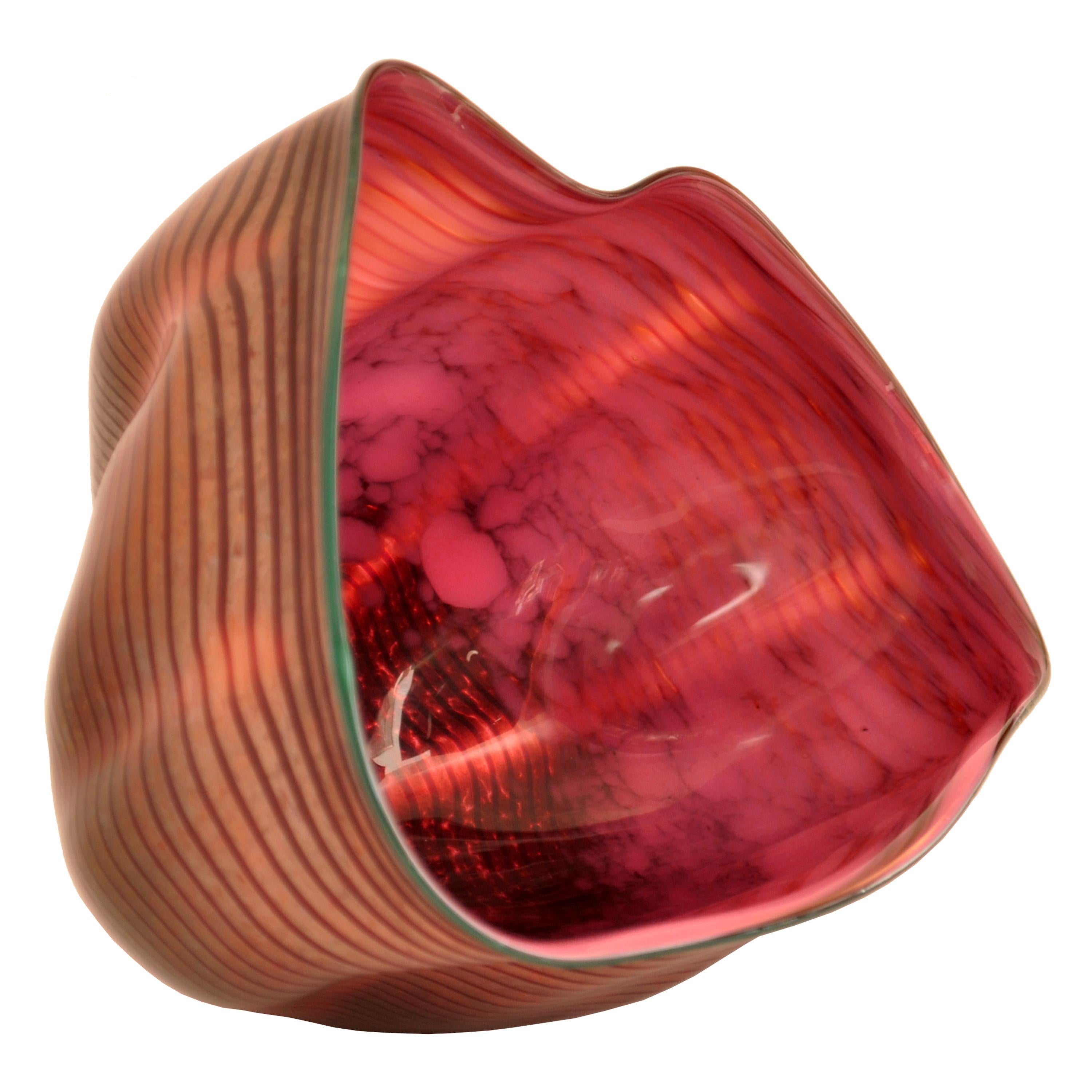 An early, rare and original Dale Chihuly Macchia glass form vessel, signed and dated 1985.
The vessel is beautifully and organically formed of red and mottled gold iridescent stripes, the mouth of the vessel have a green lip.
Condition is
