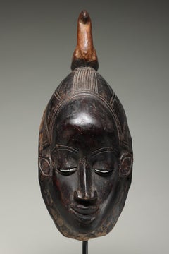 Early Danced Black Wood Mask From the Guro Peoples Ivory Coast Bird on top