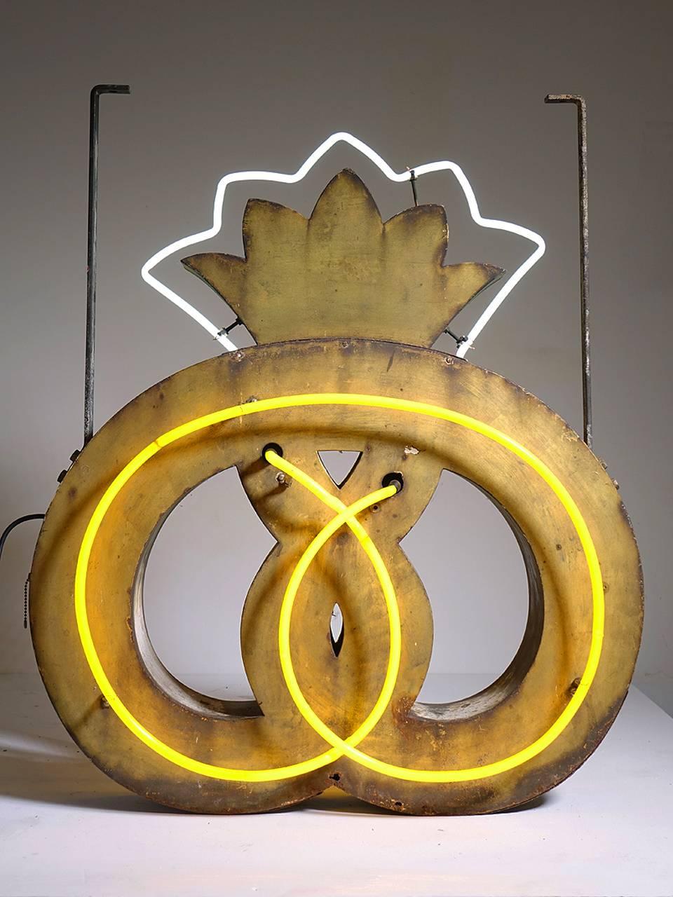 When we first found this neon sign our restorer was excited to work on it. He believes that the sign was a handmade and one-off being produced by a skilled metal fabricator. It was most likely used outside a small shop in Denmark. This is a