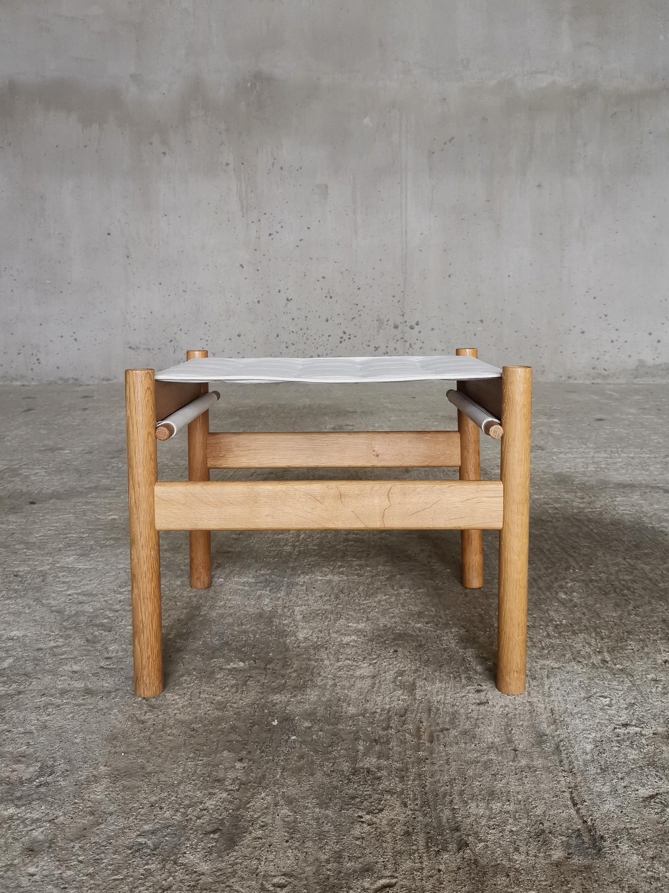 Early and rare Hans Bølling Oak Stool Quilted Canvas seat, for Torben Ørskov Denmark 1960s
Both Oak Wood and Canvas seat of Stool is rarely seen, especially in this good condition.

Dimensions:
H: 47 cm
W: 45 cm
D: 41 cm
SH: 46 cm

