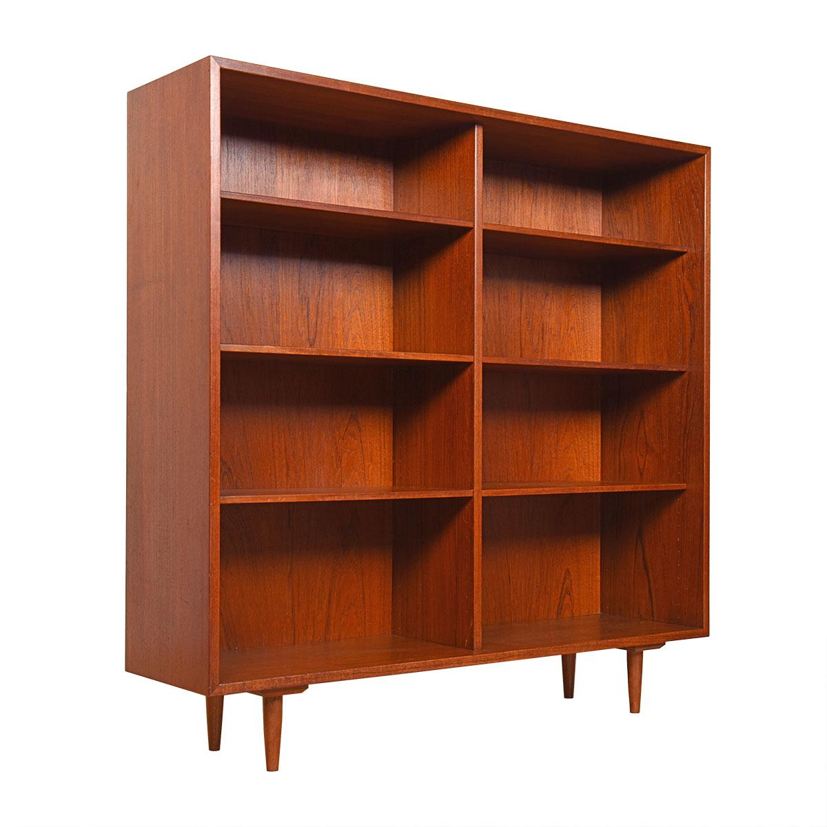 Stunning Danish Modern bookcase — earlier vintage with a deep patina.
Fabricated of teak, the graining and tones make a gorgeous backdrop to any display. Deeper than most at 14.25