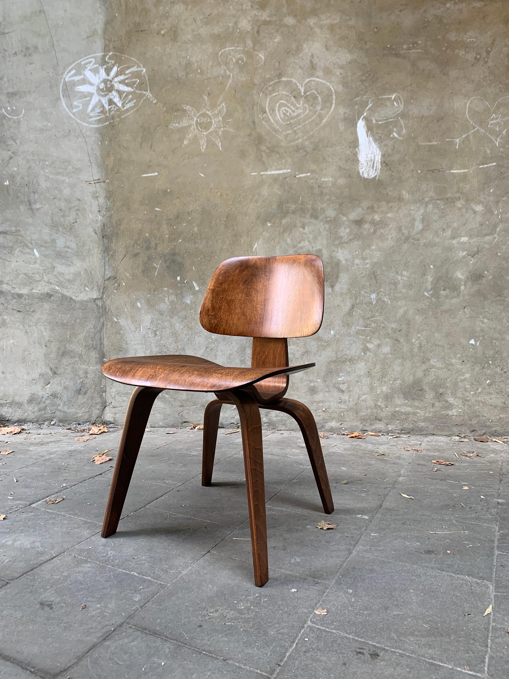 The DCW (=Dining Chair Wood) chair was designed by Charles and Ray Eames around 1945.
		
This is a first generation chair produced by Evans Molded Plywood Company between 1946 and 1948 (Herman Miller bought the Evans Plywood Division in 1949 and