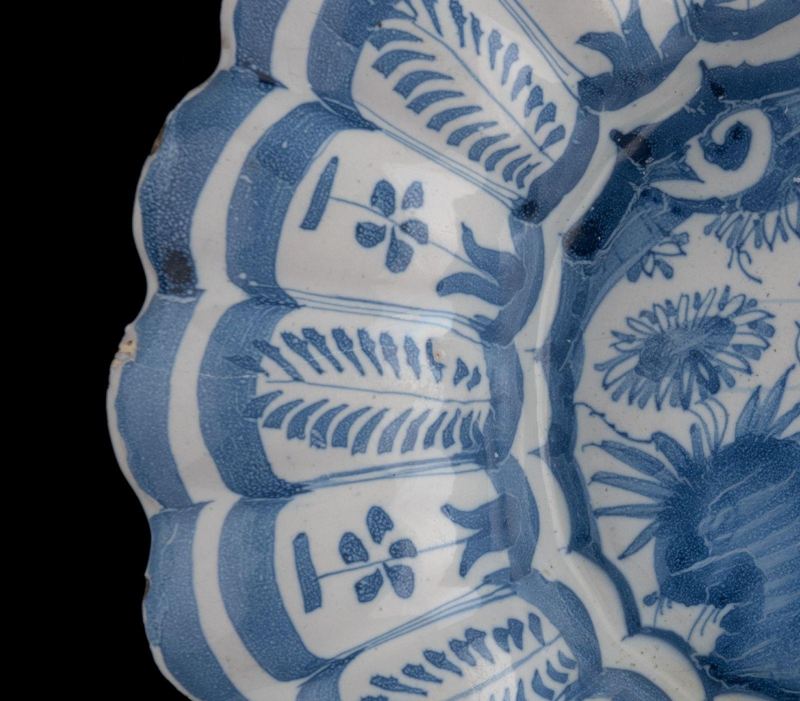 Dutch Early Delft Blue and white chinoiserie lobed dish The Netherlands, 1630-1650 For Sale
