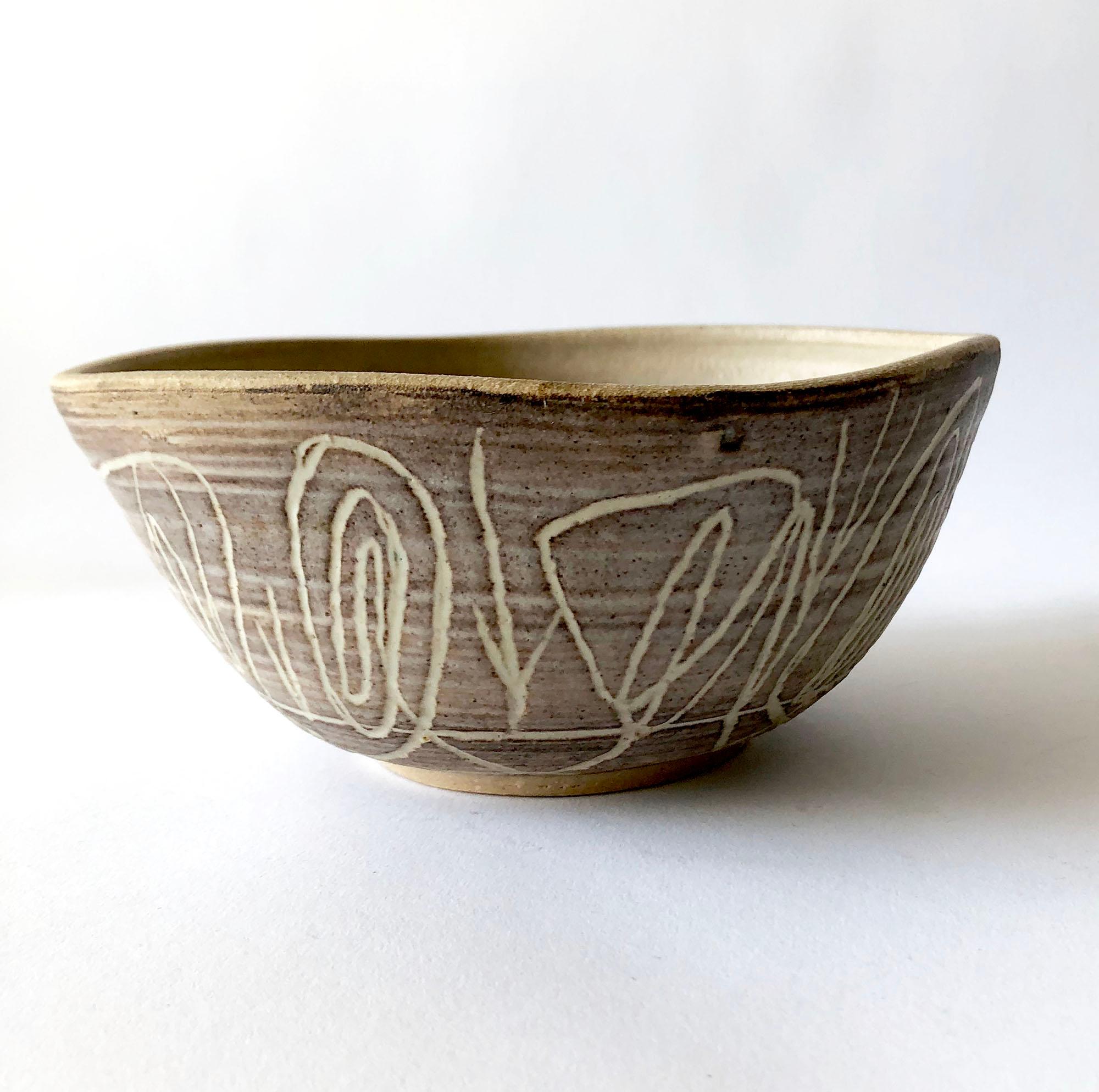 Handmade California studio stoneware bowl with abstract modern carved design created by Dora De Larios of Los Angeles, California. Bowl measures 3.5