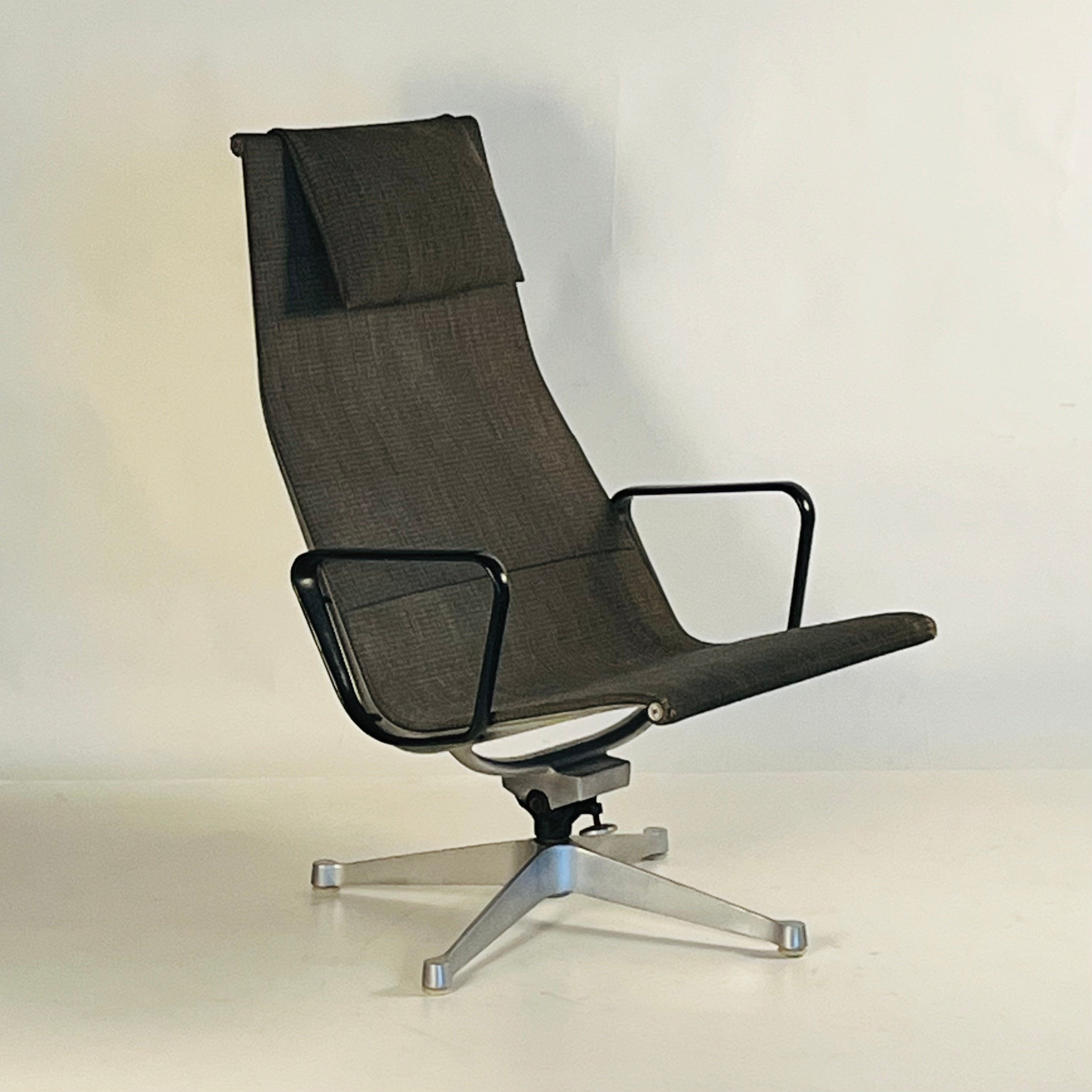 This is an early Aluminum Group 684 lounge chair and matching ottoman by Charles and Ray Eames for Herman Miller. Extremely cool and comfortable piece despite the wear. We're selling this piece in its original condition in the rare Saran fabric.