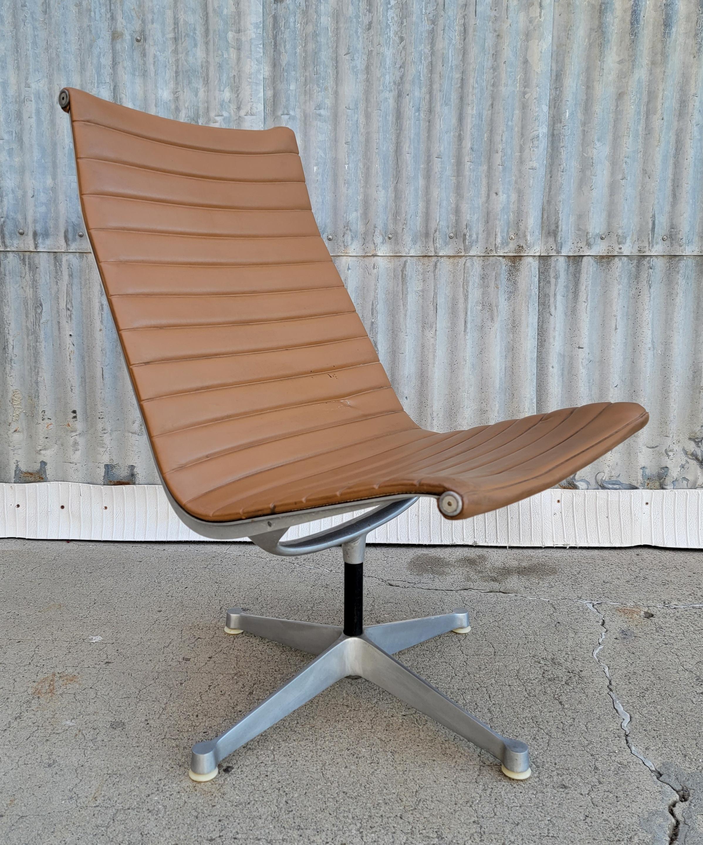 Early production charles & Ray Eames aluminum group chair. If you are seeking an original vintage Eames chairs with patina and character from use, this may be a contender. Signed with Herman Miller logo cast into frame. Structural integrity intact.