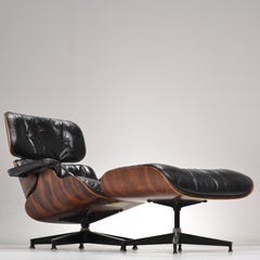 Früher Eames-Stuhl und Ottomane aus Palisanderholz
