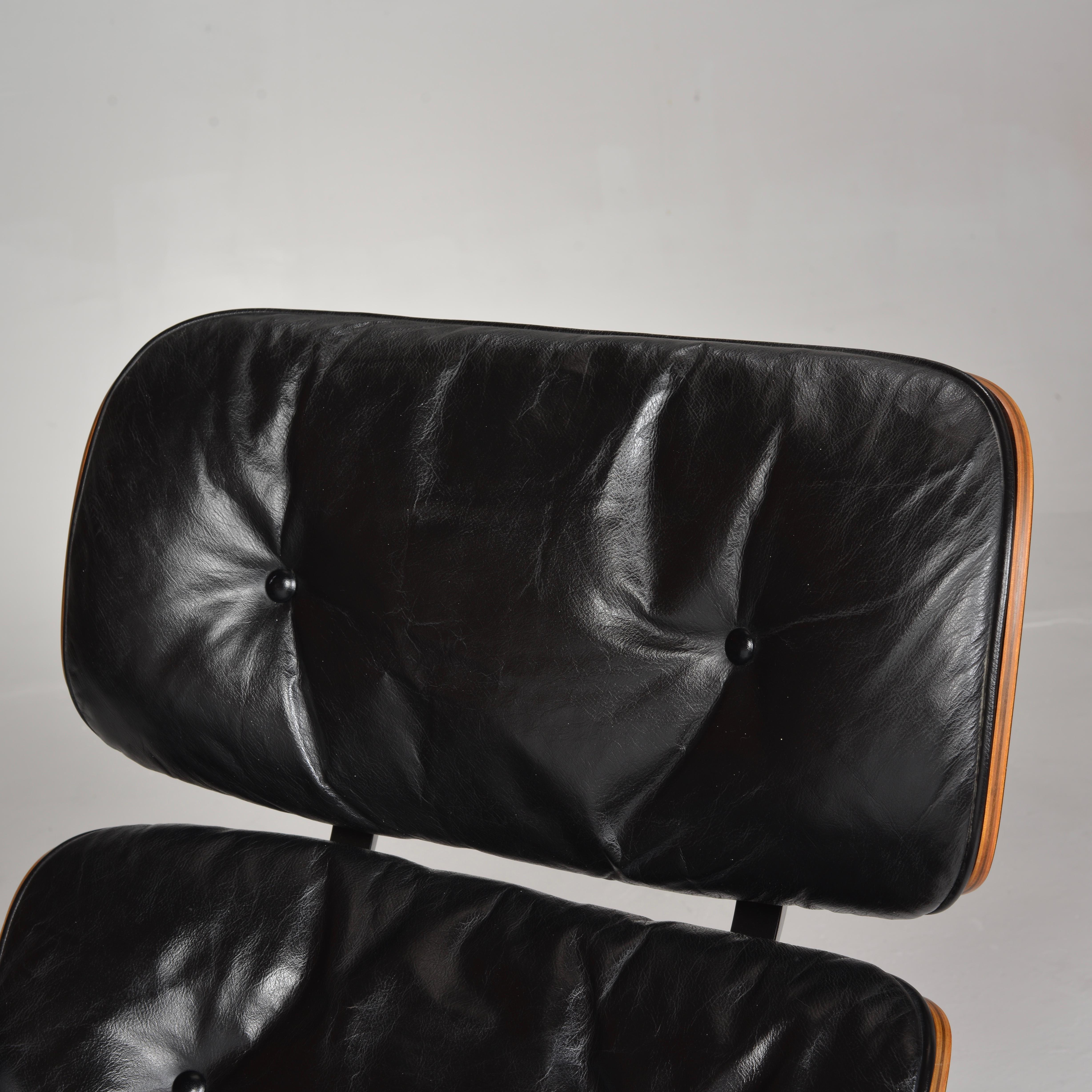 Leather Early Eames Chair and Ottoman in Rosewood For Sale