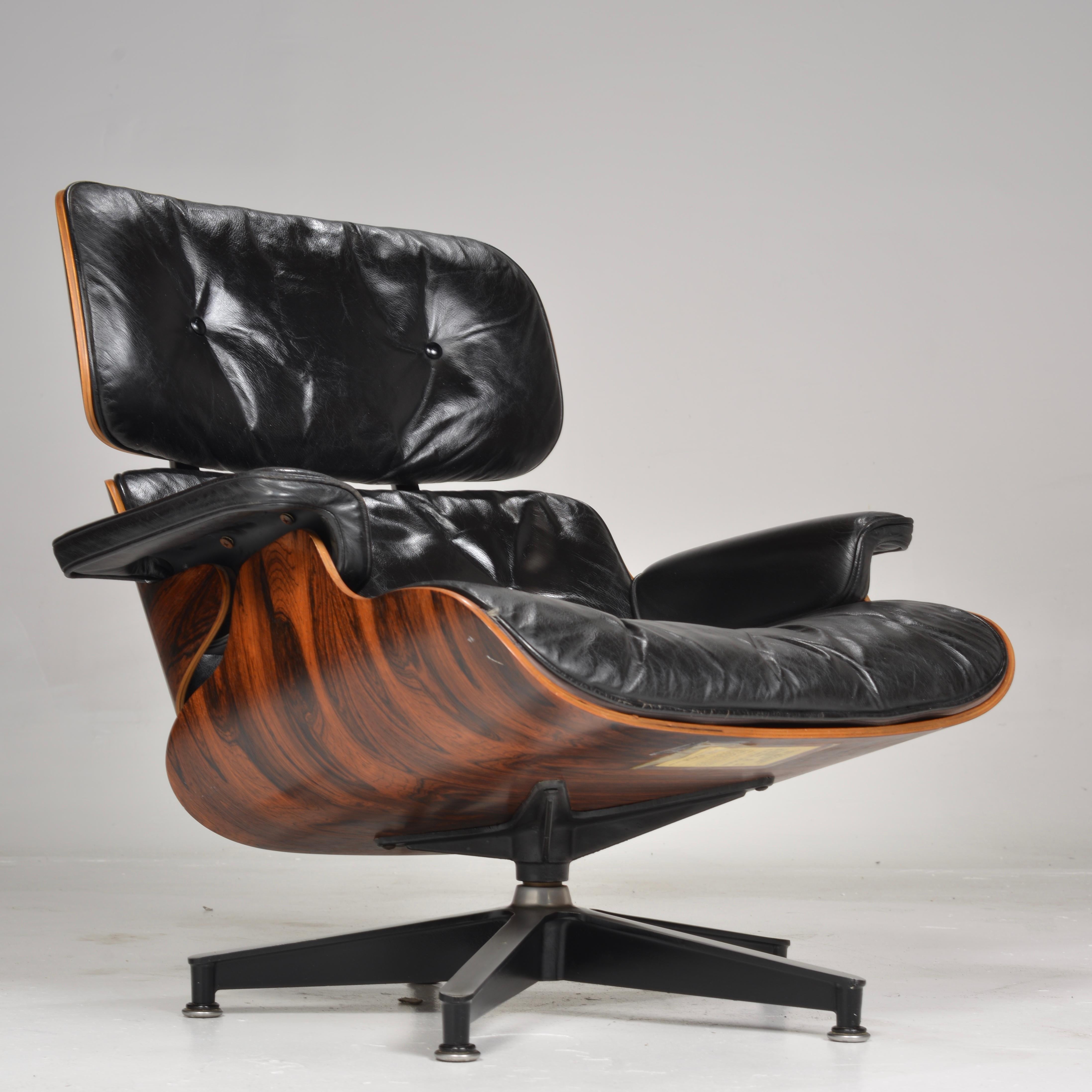 Early Eames Chair and Ottoman in Rosewood For Sale 1