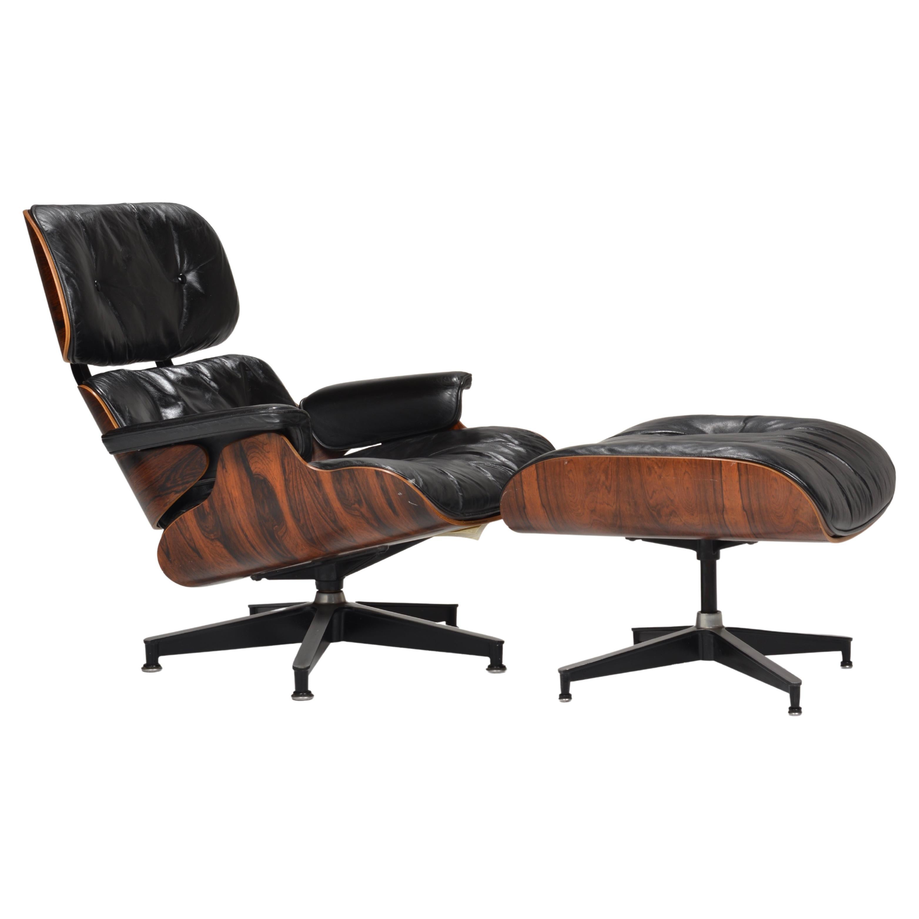 Early Eames Chair and Ottoman in Rosewood For Sale
