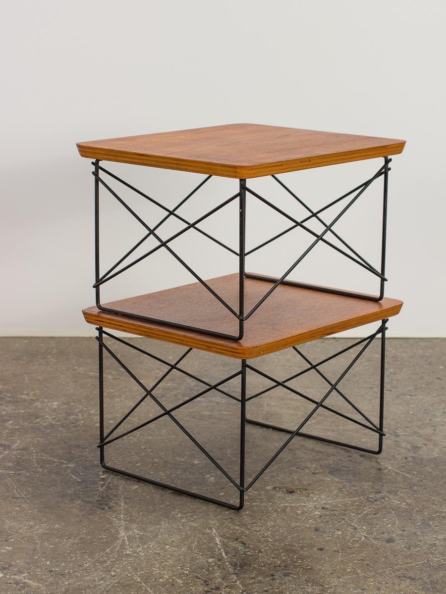 First-generation set of walnut LTR tables, designed by Charles and Ray Eames for Herman Miller. These are some of the earliest we have seen. Walnut veneer has been refreshed, retains lovely patina from age. Finish to frame is in wonderful original