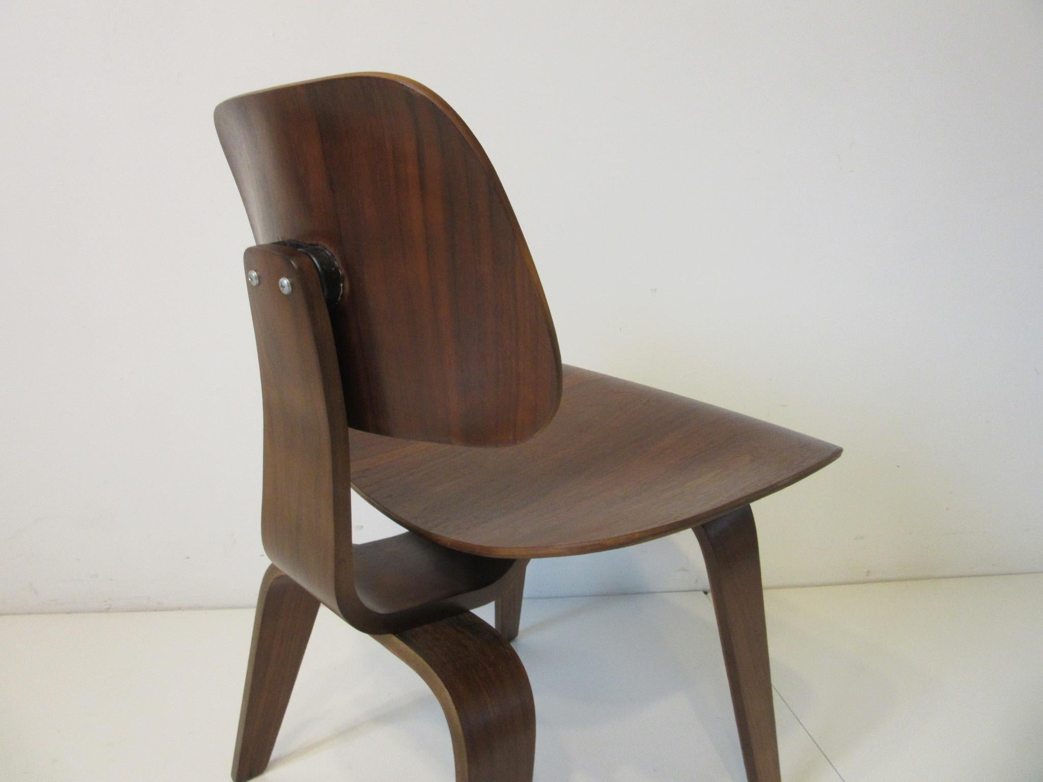 20th Century Early Eames Sculptural Walnut DCW by Herman Miller  ( A )
