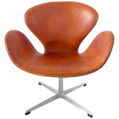 Early Edition Arne Jacobsen Swan Chair in Original Cognac Leather Denmark, 1964