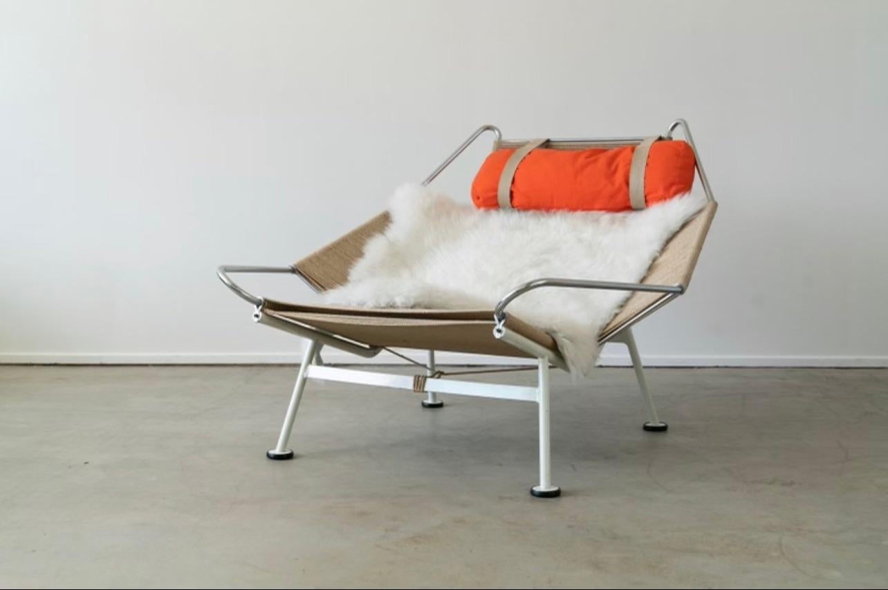 Early edition flag chair by Hans J. Wegner-
Easy chair with original white steel frame , orange neck cushion and original feet. 
Designed by Hans J. Wegner, 1950s Early Edition, manufactured by Getama, Denmark, Model GE225.
Great vintage