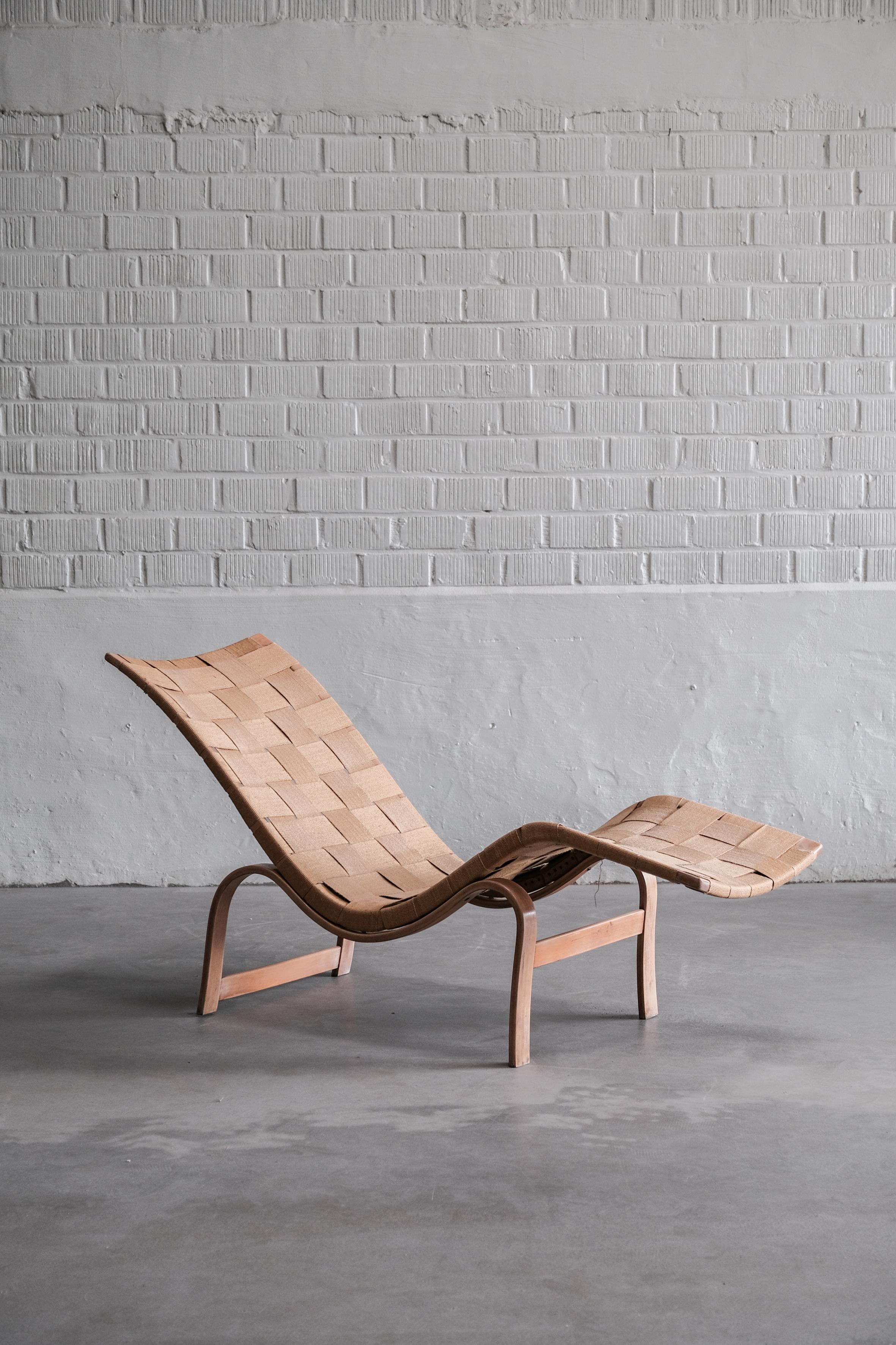 Very ealier edition of this unique and rare lounge chair. 

About the creators:

Bruno Mathsson was born in 1907 in Värnamo, Sweden. His father, Karl, was a fourth-generation master cabinetmaker, so Bruno was exposed early on to the possibilities of