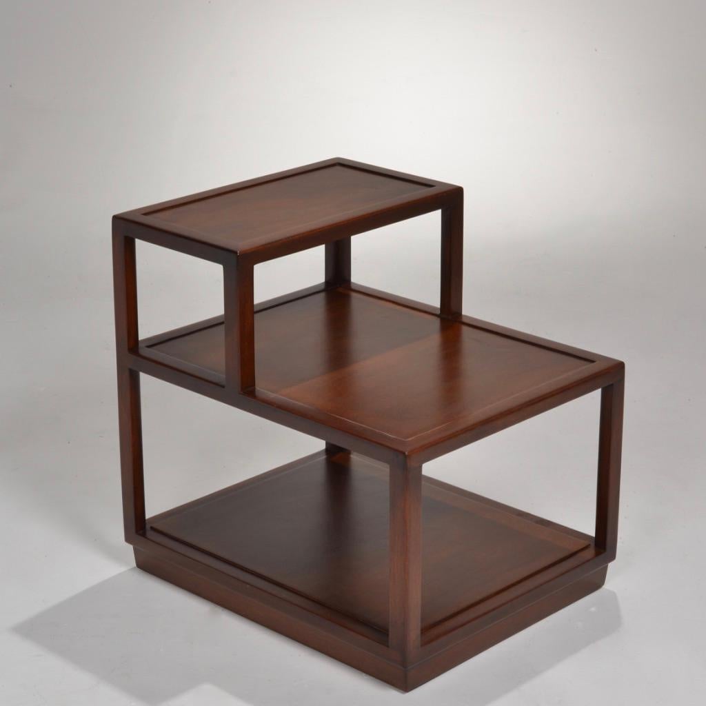 Three-tiered step up side table designed by Edward Wormley for Dunbar, circa 1950. 
This table is in wonderful condition and can be used as an end table or nightstand. 
Fully marked.
